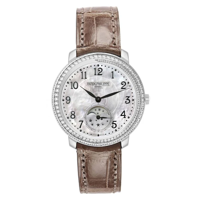 Complications (Reference 4968G-010). A 33mm white gold diamond-set