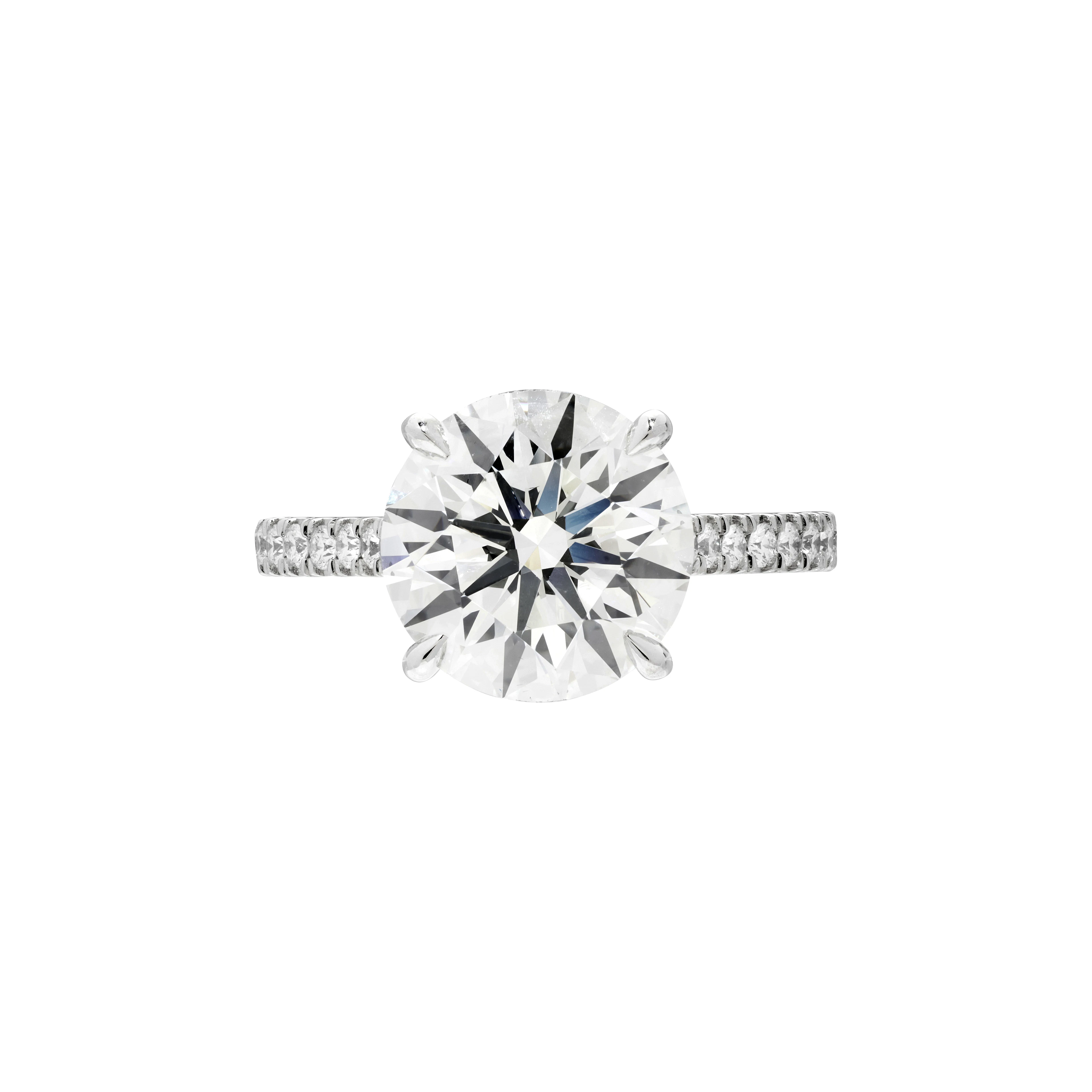 Platinum, 4.28ct Round Brilliant Cut Diamond and Diamond Engagement Ring
