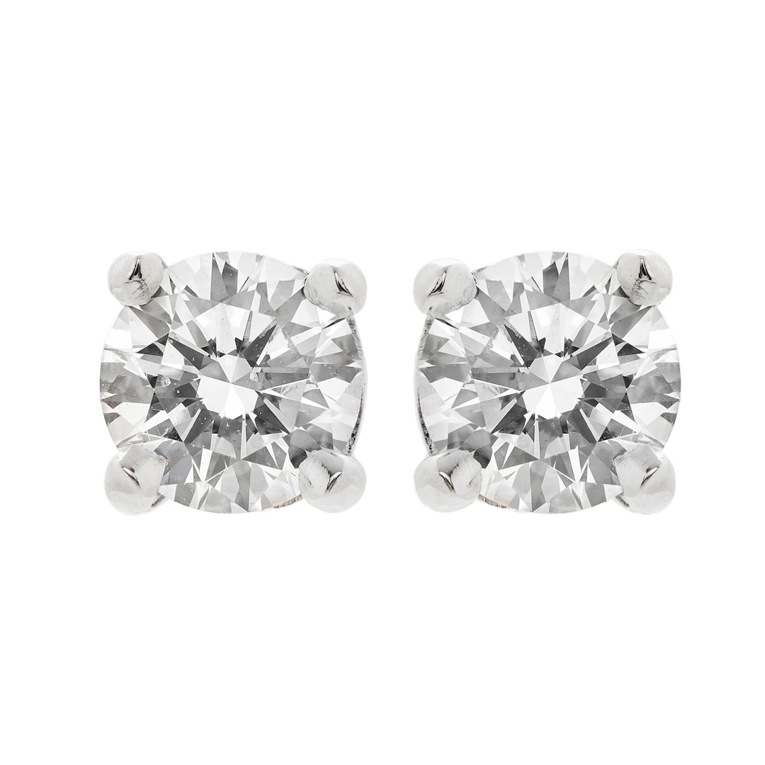 Platinum and 1.04ctw Round Brilliant Cut Diamond Stud Earrings