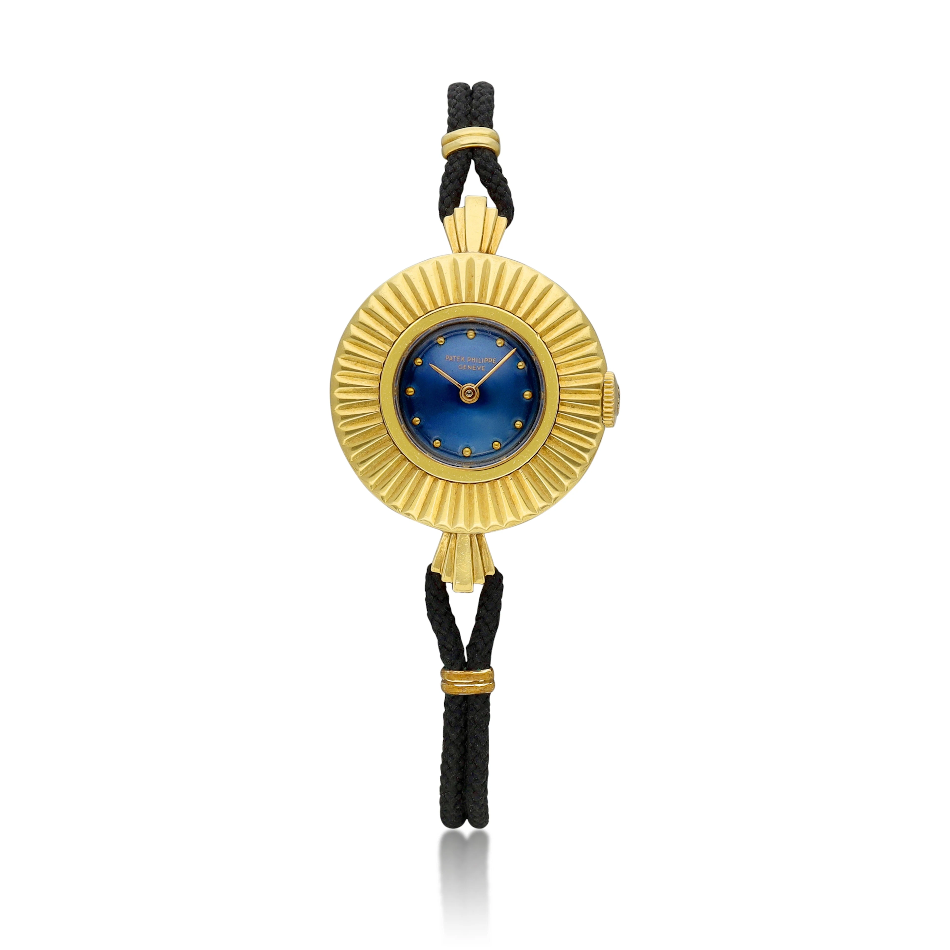 Patek Philippe. A 24mm gold manual wind wristwatch. 1970