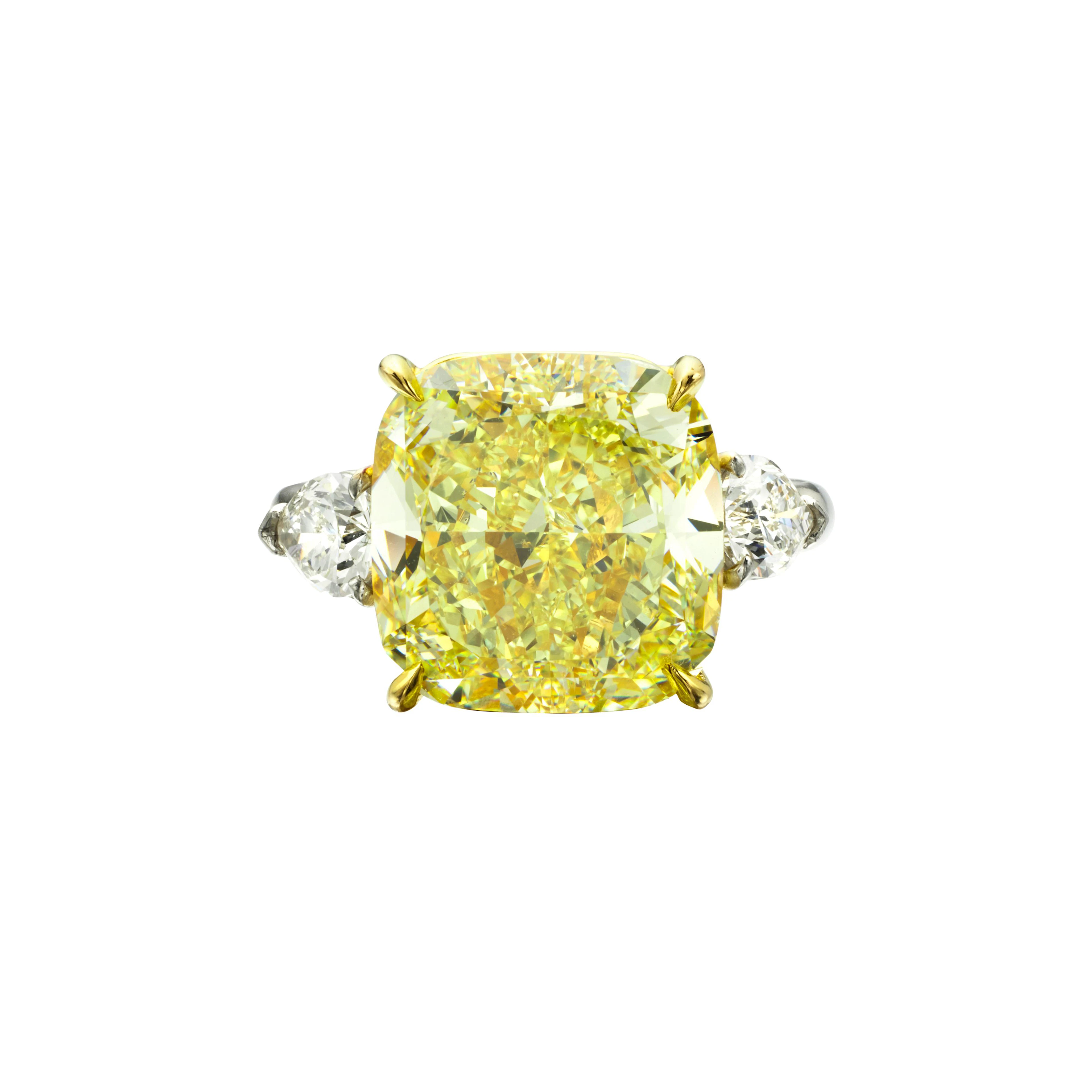 Platinum, 13.05ct Cushion Cut Fancy Yellow Diamond and Diamond Ring