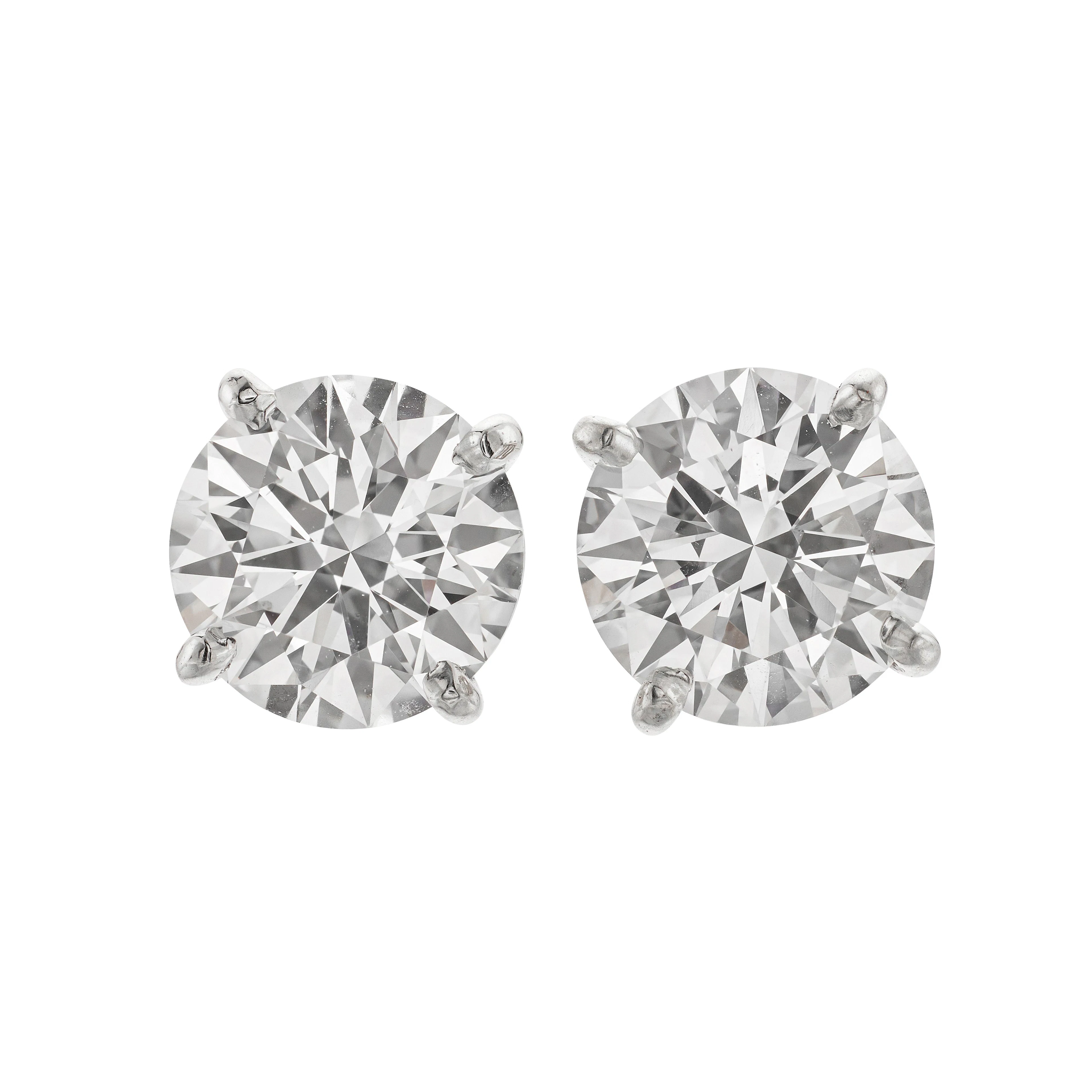 Platinum and 3.01ctw Round Brilliant Cut Diamond Stud Earrings
