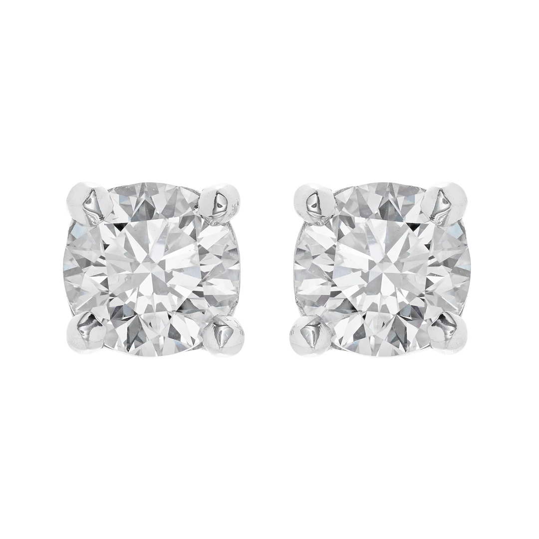 Platinum and 1.40ctw Round Brilliant Cut Diamond Stud Earrings