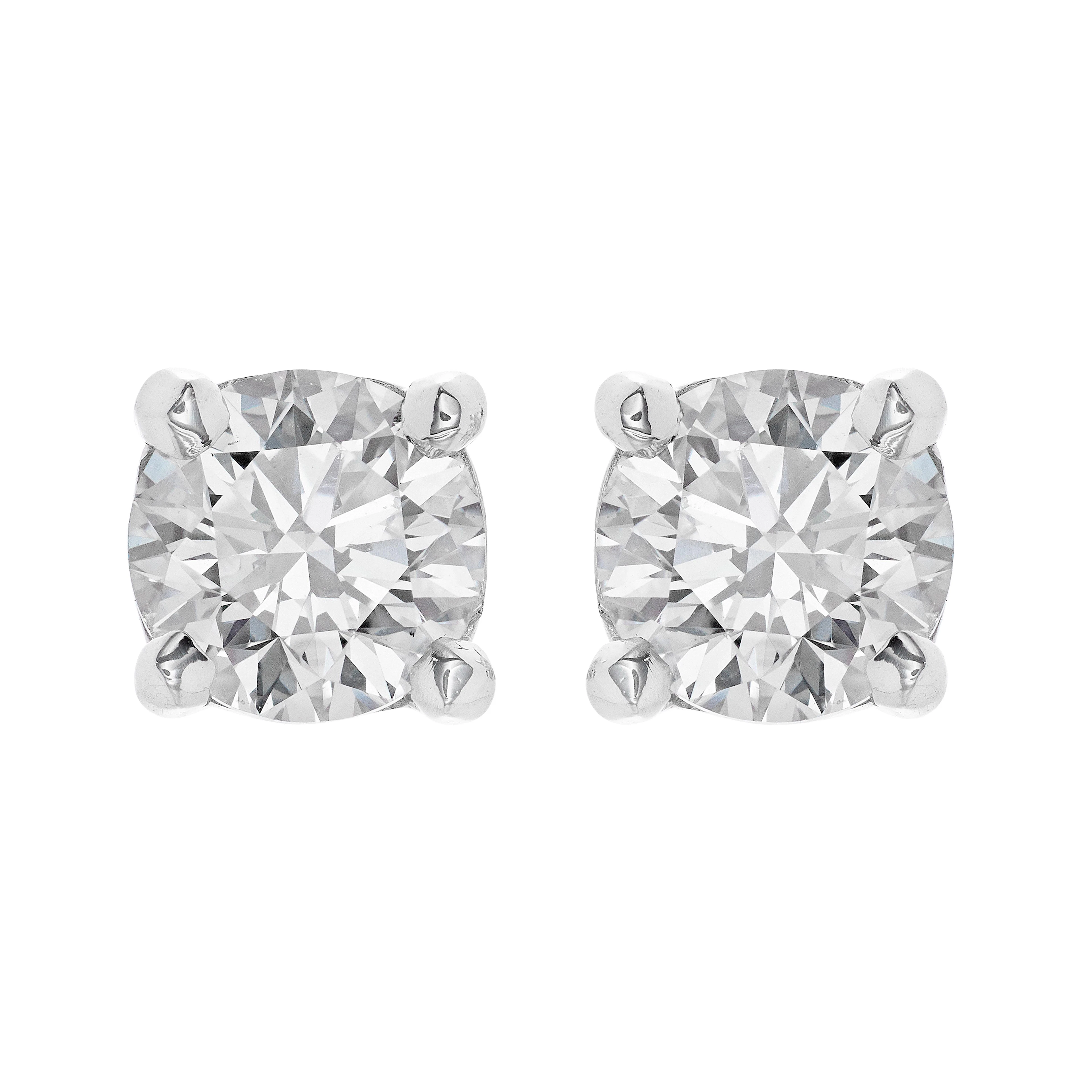 Platinum and 1.40ctw Round Brilliant Cut Diamond Stud Earrings