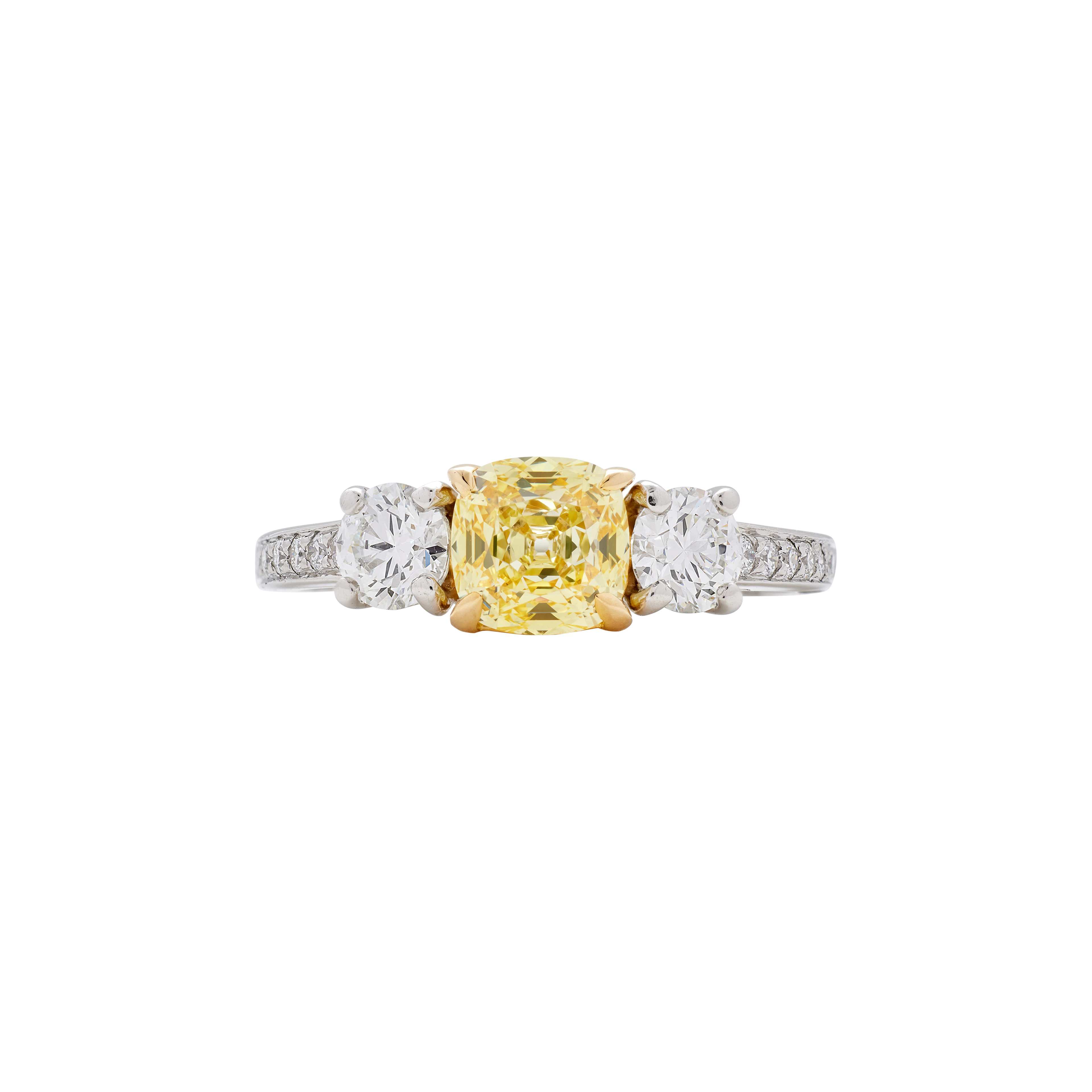 Platinum, Gold, 1.02ct Fancy Yellow Diamond and Diamond Threestone Ring