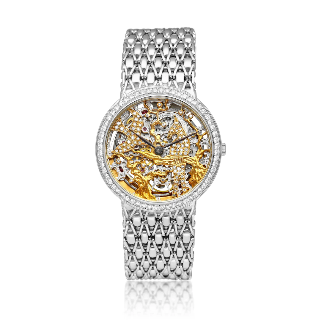 Audemars Piguet. A white gold and diamond-set skeletonized automatic