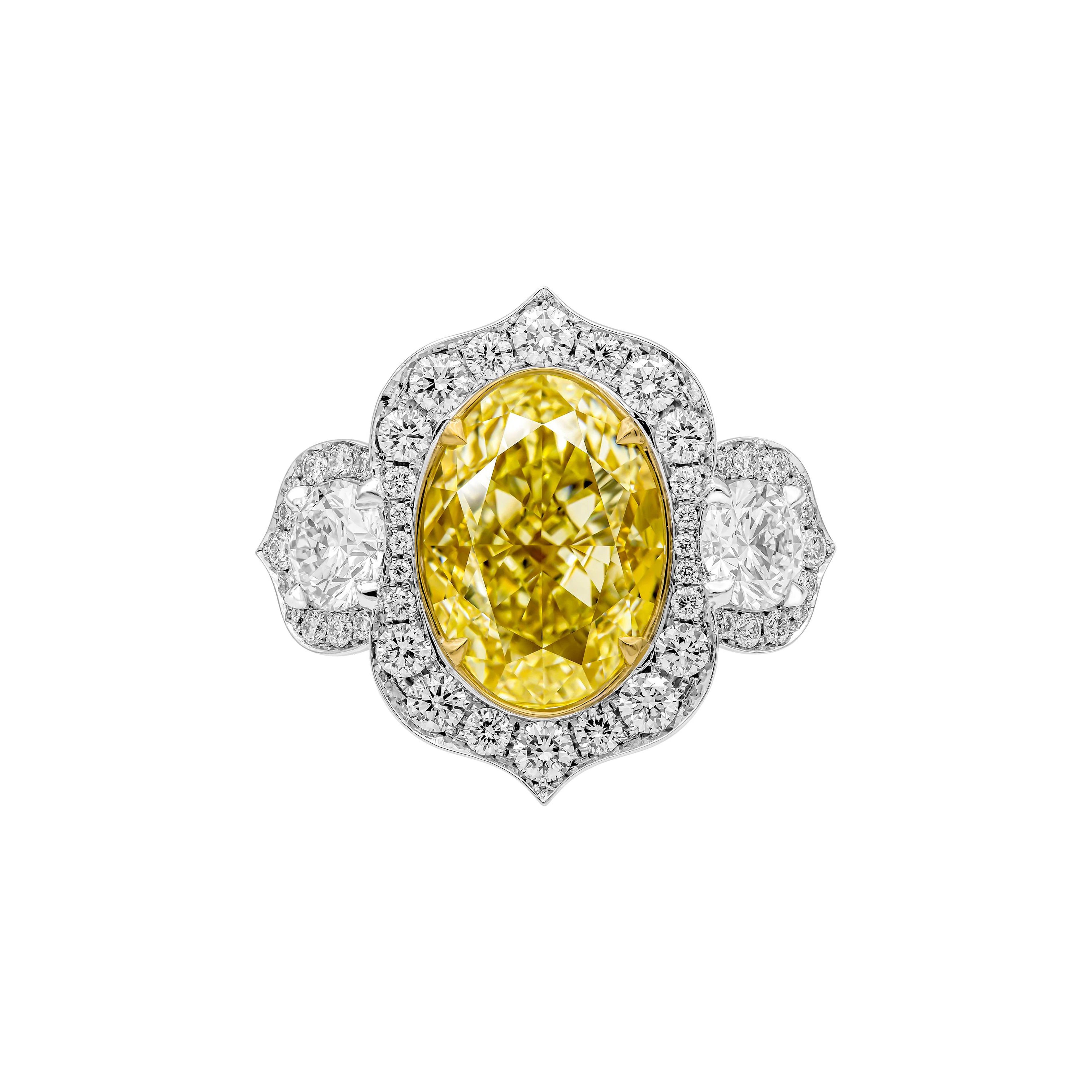 Platinum, Gold, 6.02ct Oval Cut Fancy Light Yellow Diamond and Diamond