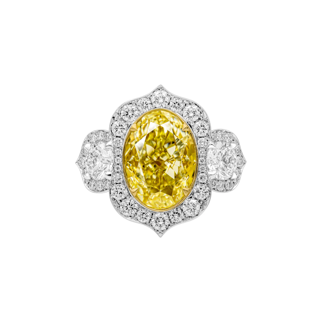 Platinum, Gold, 6.02ct Oval Cut Fancy Light Yellow Diamond and Diamond