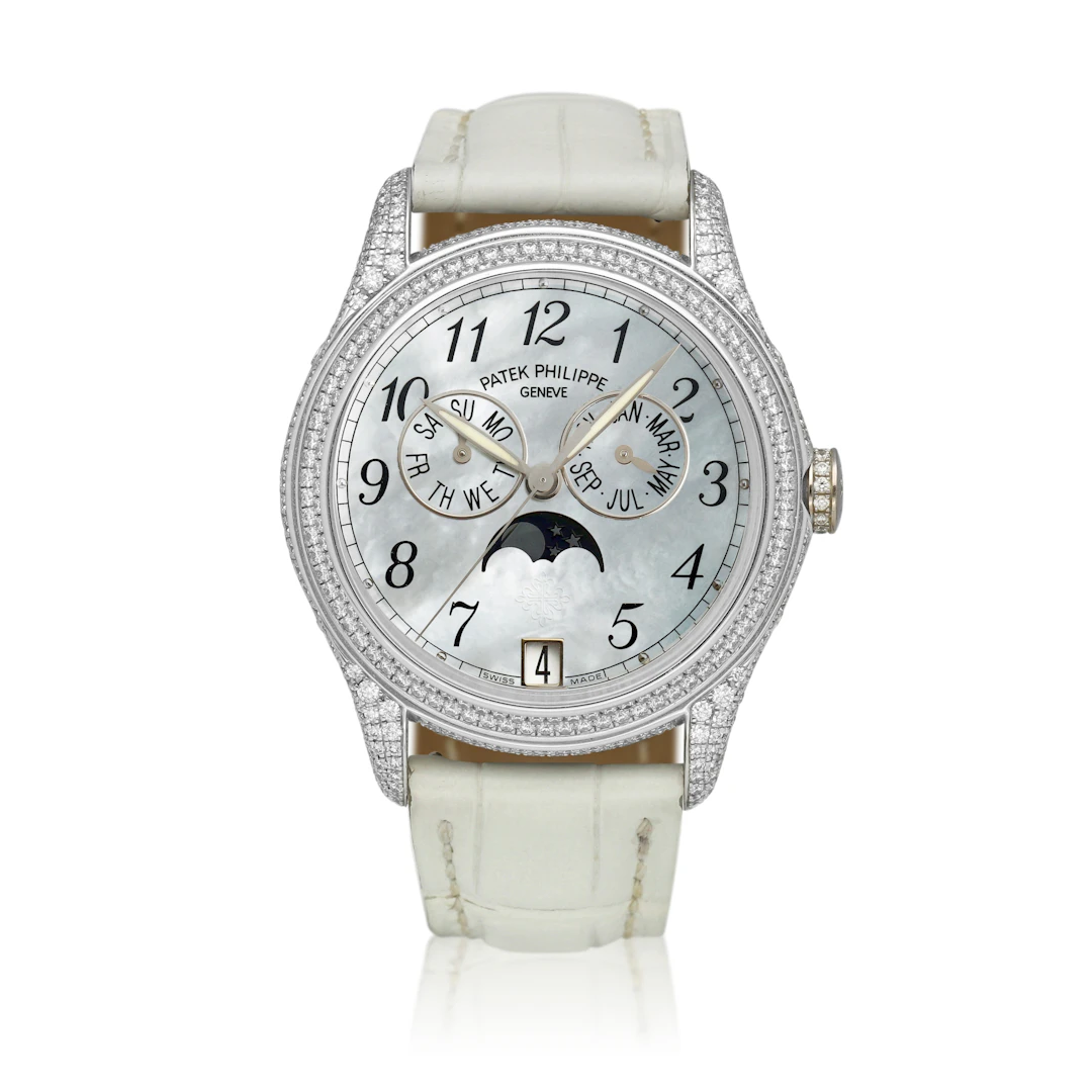 Complications (Reference 4937). A 37mm white gold diamond-set automatic