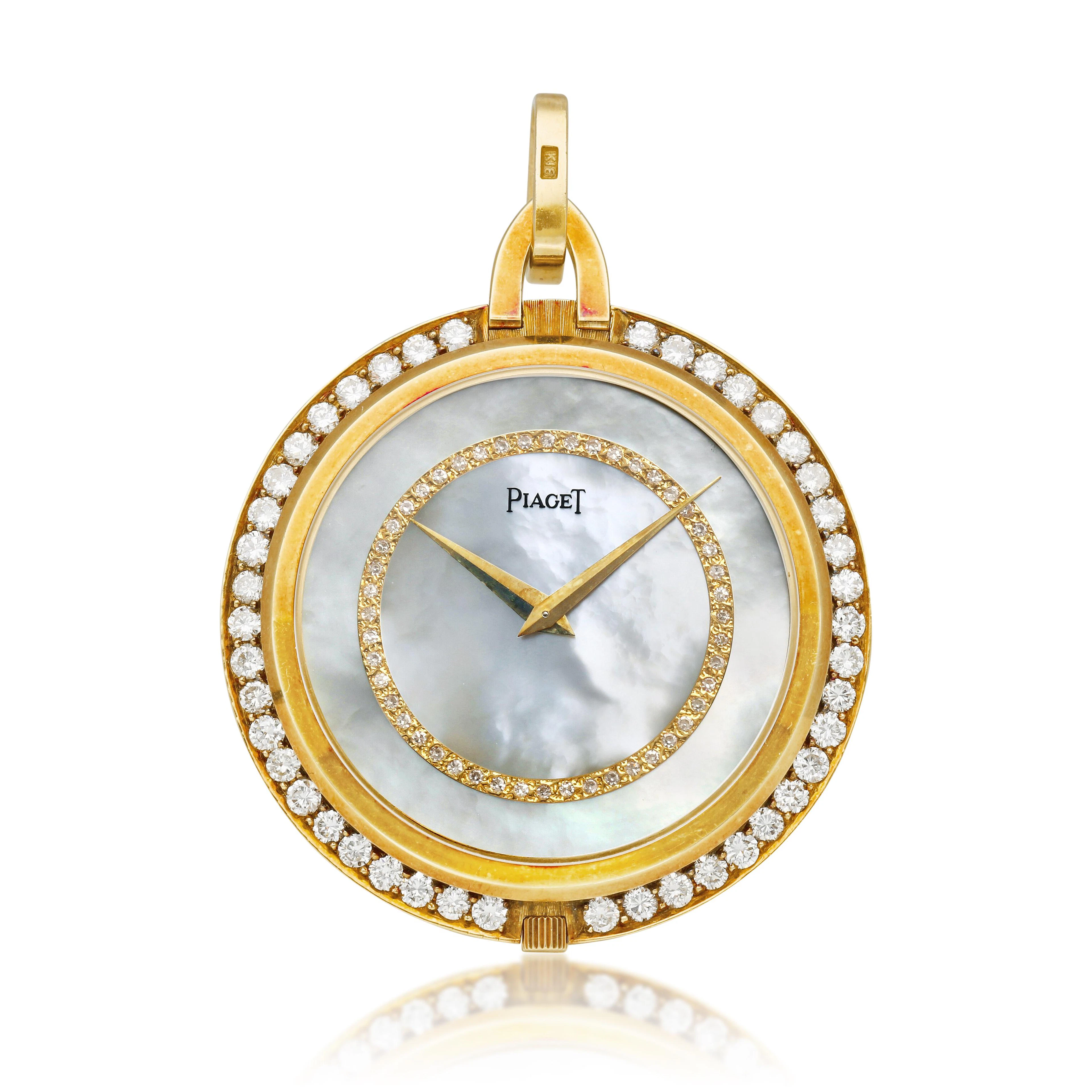 Piaget. A yellow gold and diamond-set open face manual wind watch