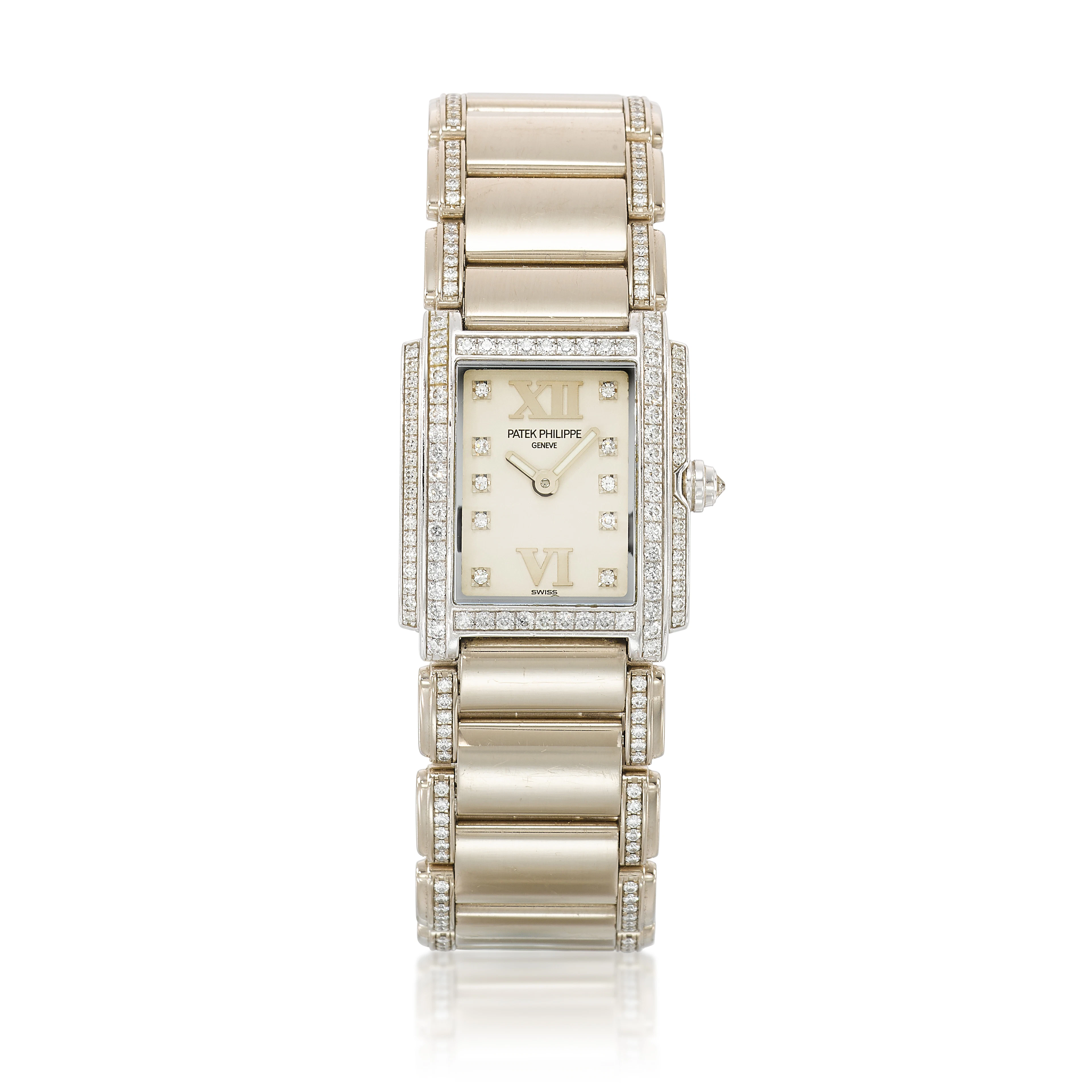 Twenty-4 (Reference 4908G). A 26.3mm white gold diamond-set quartz