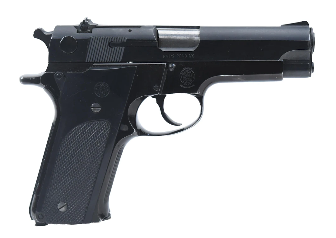 SMITH & WESSON MODEL 59 9MM PISTOL WITH BOX.