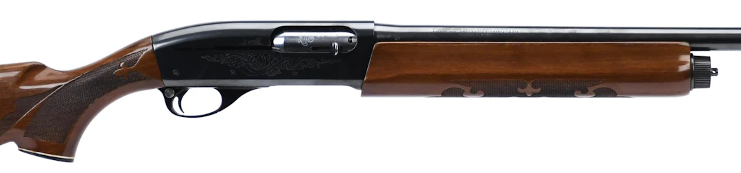 REMINGTON MODEL 1100 12 GA SEMI AUTO SHOTGUN.