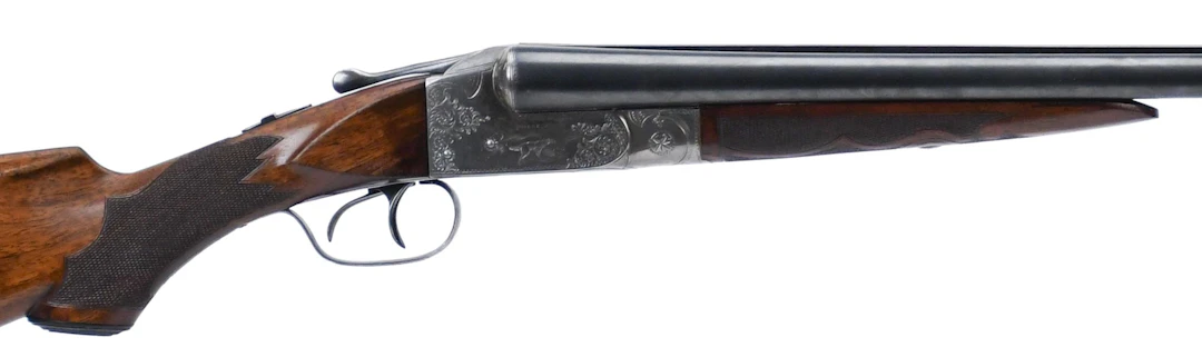 ITHACA FLUES 16 GA SIDE BY SIDE SHOTGUN.