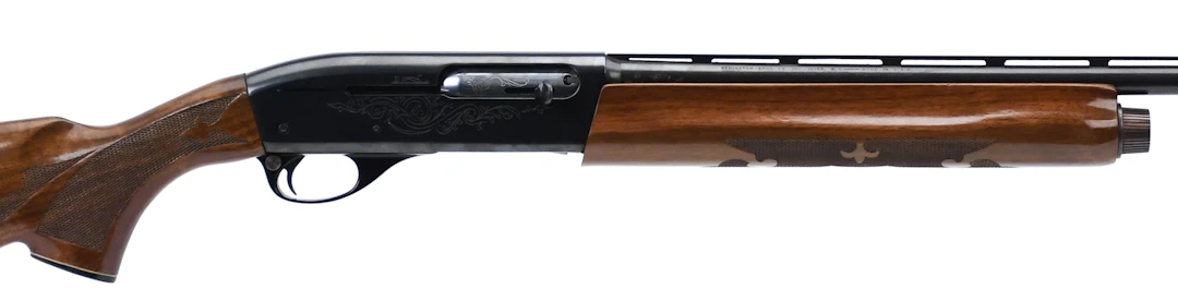 REMINGTON MODEL 1100 LW 28 GA SEMI AUTO SHOTGUN.