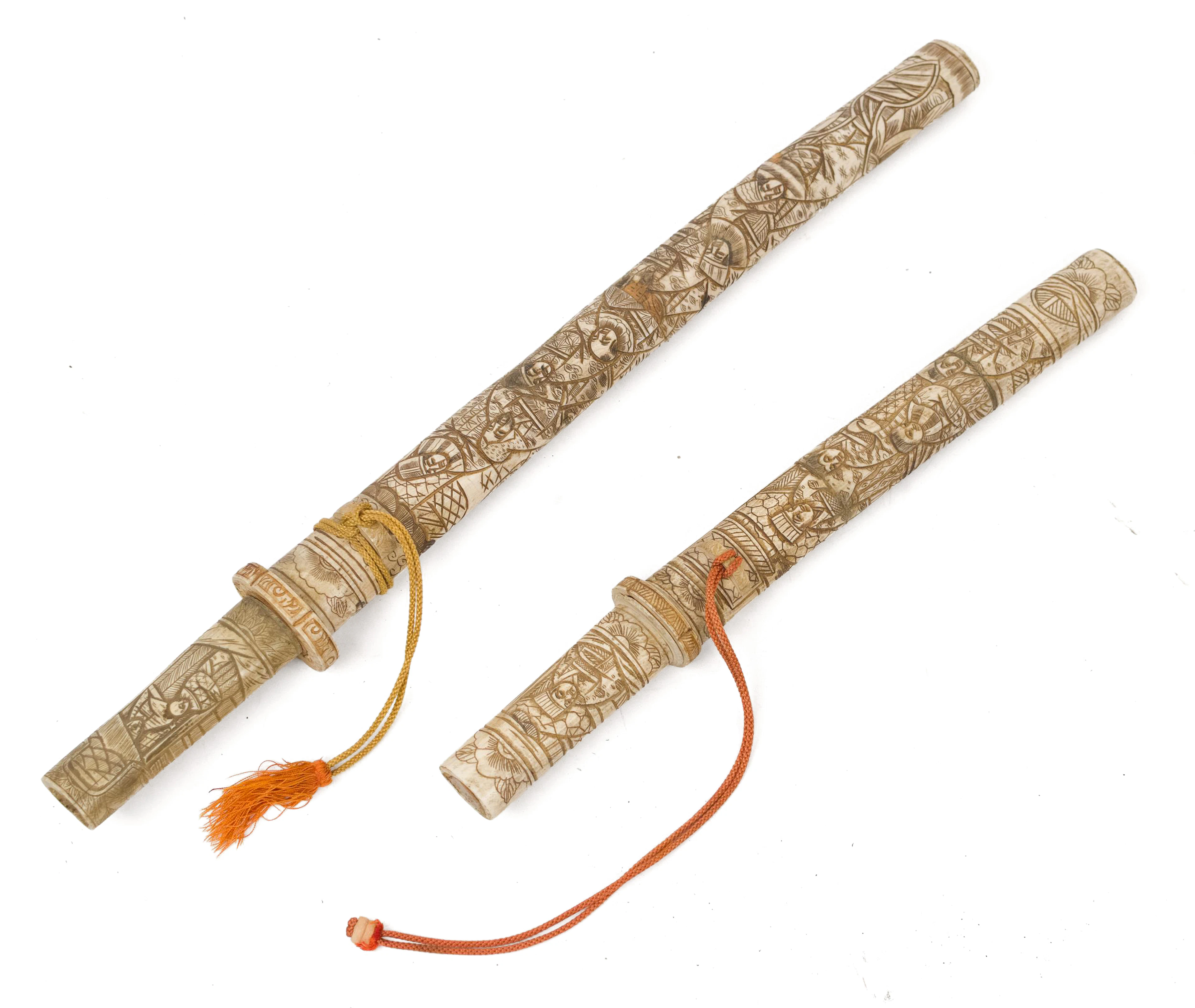 TWO EARLY 20TH C. ASIAN CARVED BONE DAGGERS.