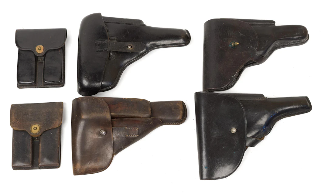 SIX 20TH C. MILITARY LEATHER HOLSTERS AND POUCHES.