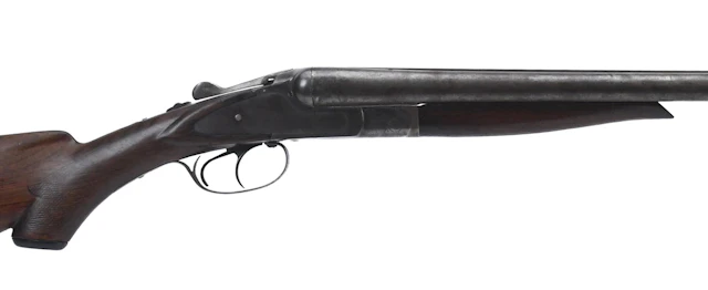 20TH C. UNION FIRE ARMS 12 GA. DAMASCUS SHOTGUN.