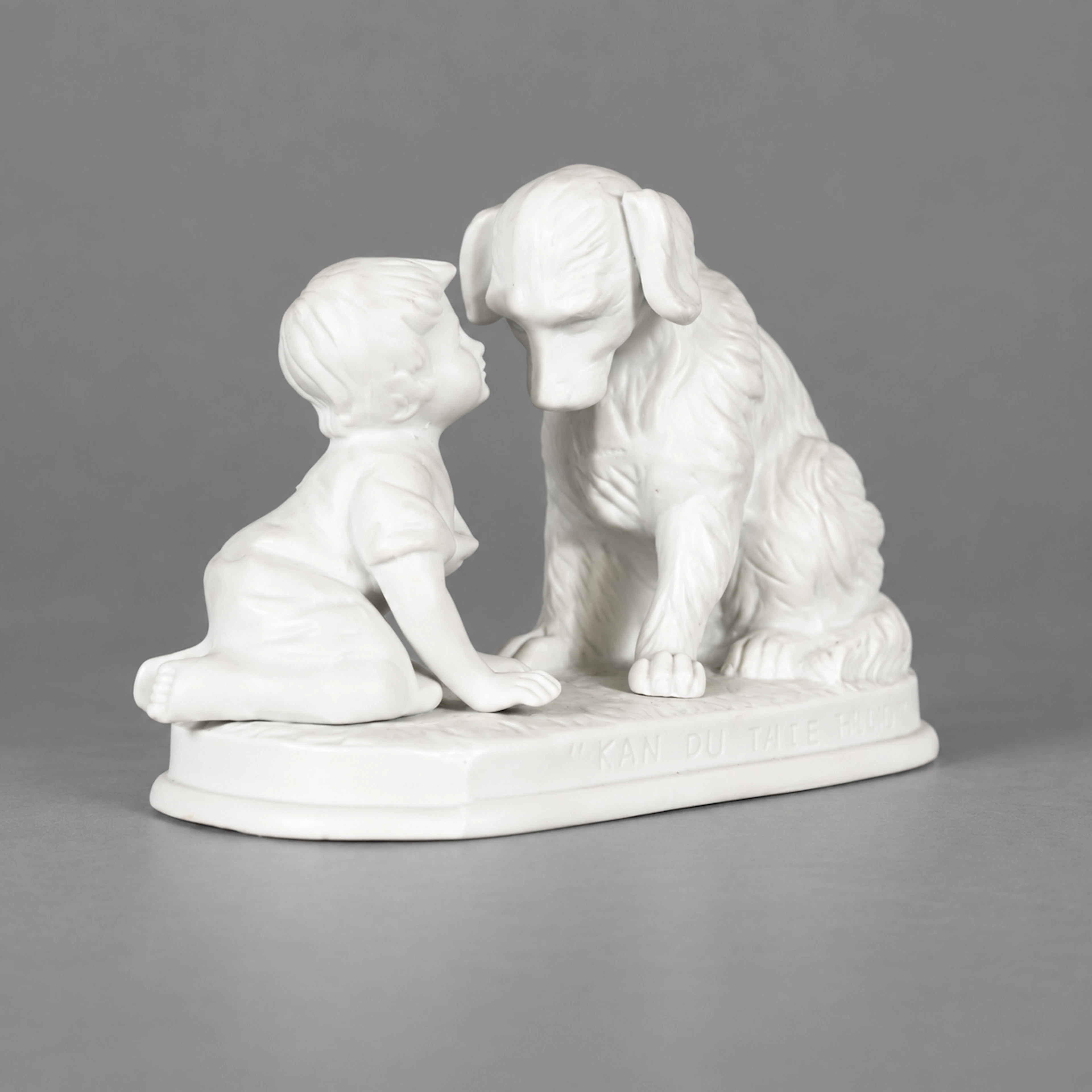 Figurin, "Kan du inte tala?", parian, Gustavsberg, 1900-talets första hälft.