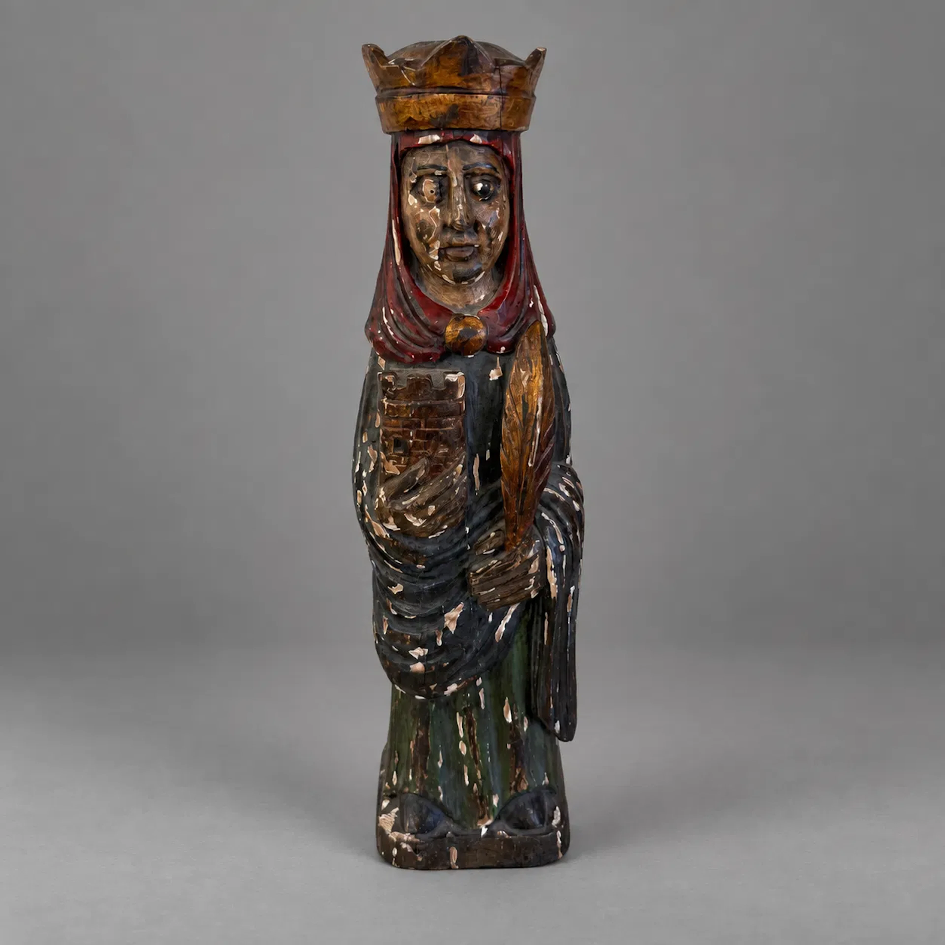 Träskulptur, föreställande krönt gestalt, äldre.