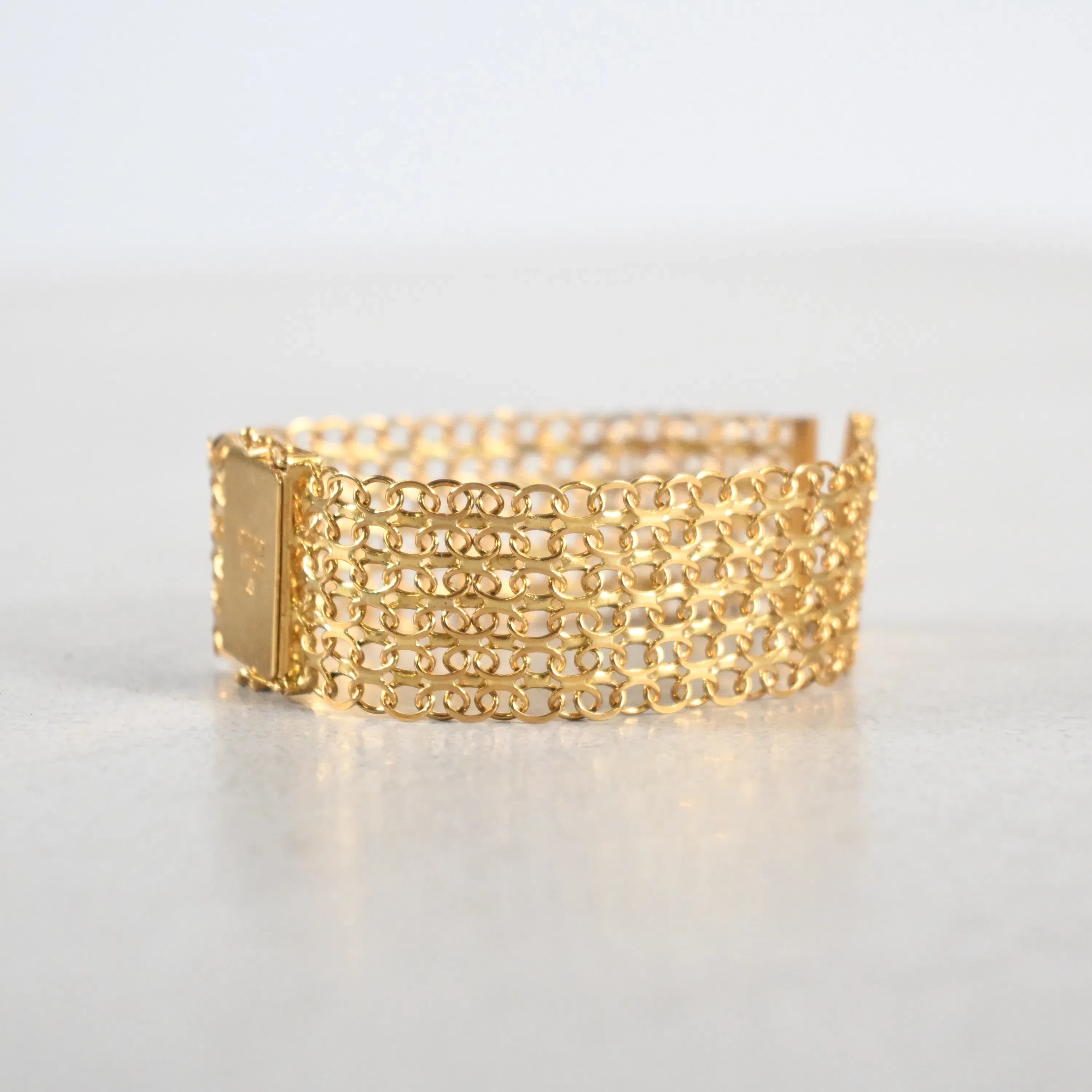 Klockarmband, X-länk, 18k guld, 1989.