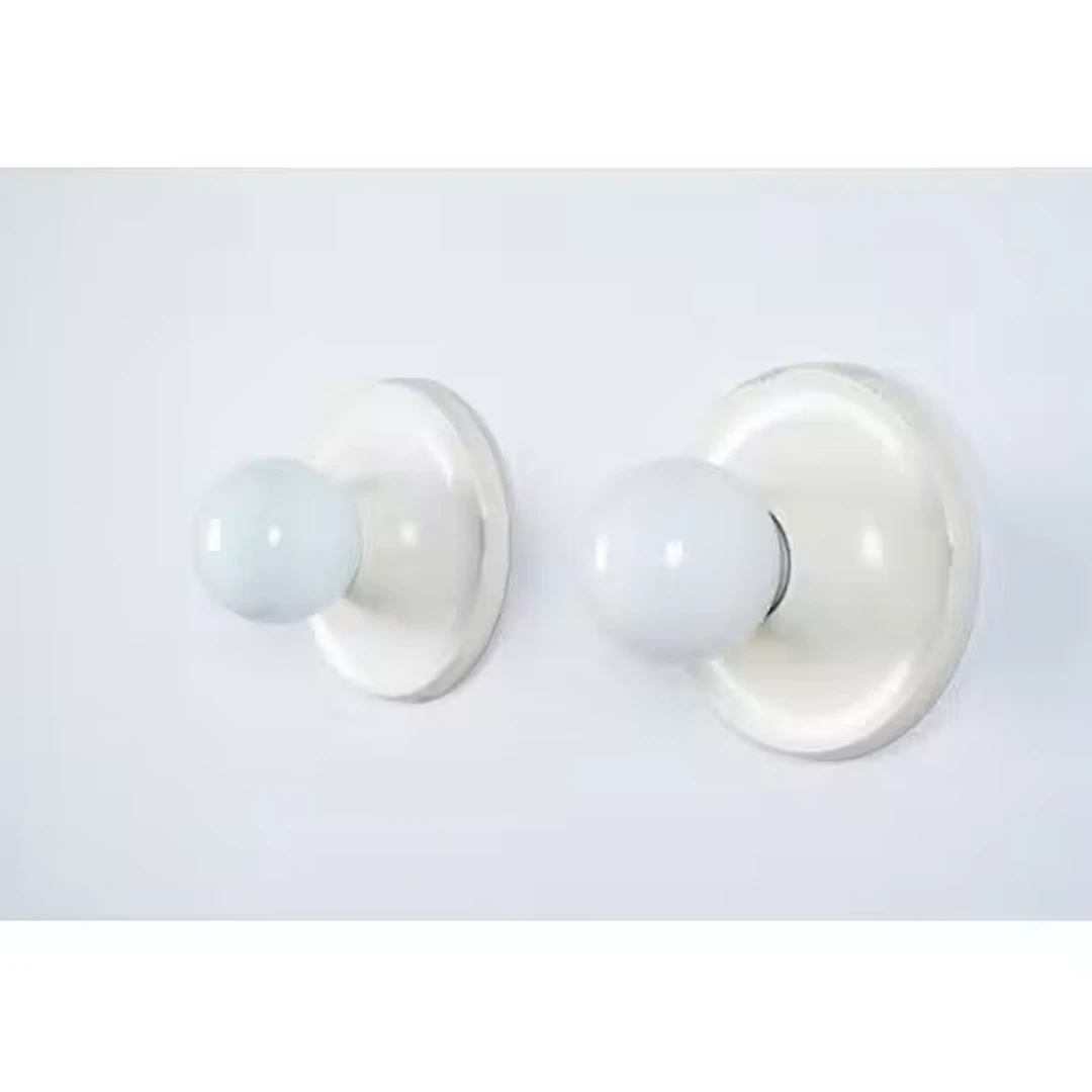 ACHILLE E PIER GIACOMO CASTIGLIONI, Coppia lampade parete/soffitto
