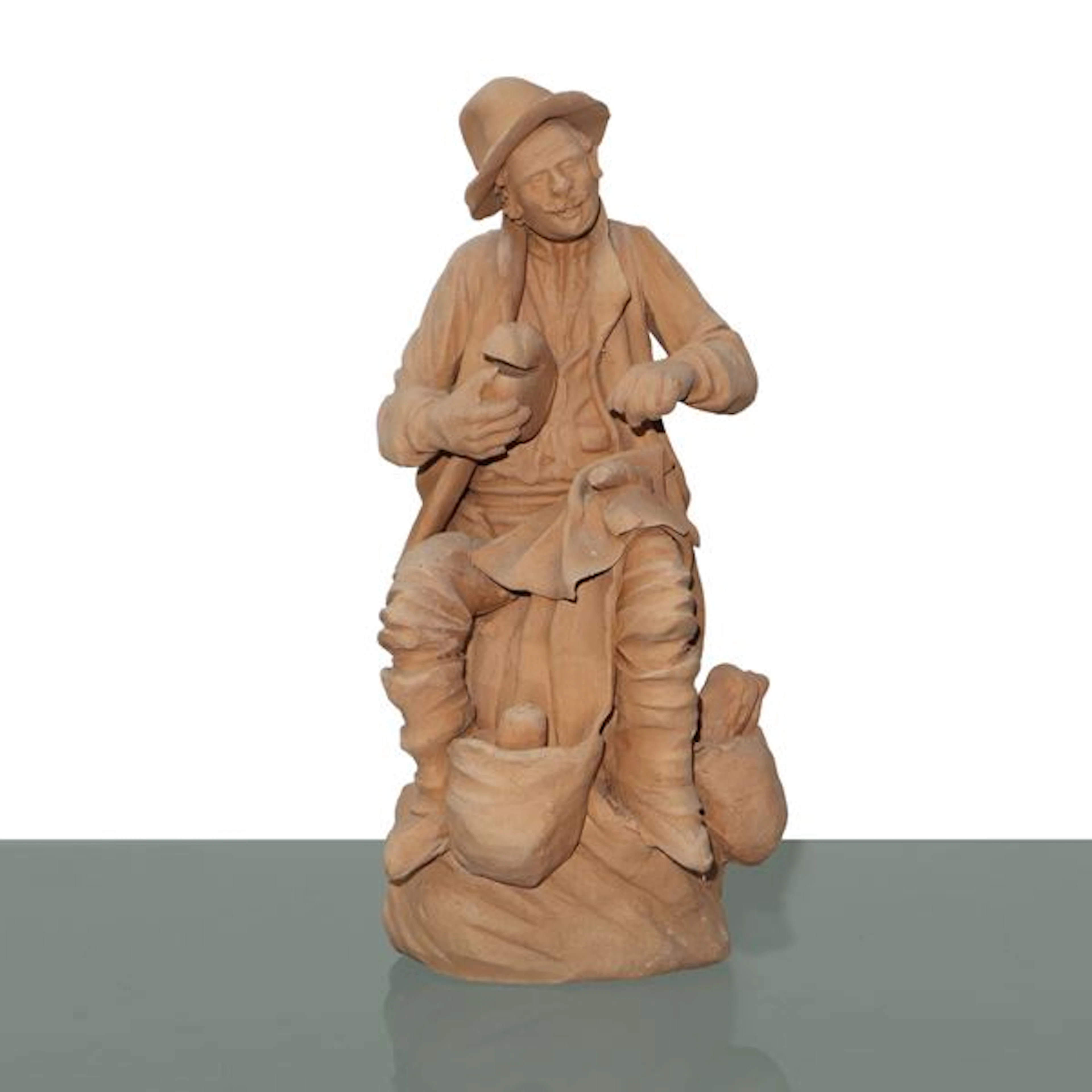 Contadino che taglia il pane - Ceramiche e presepi d'arte Scarlatella