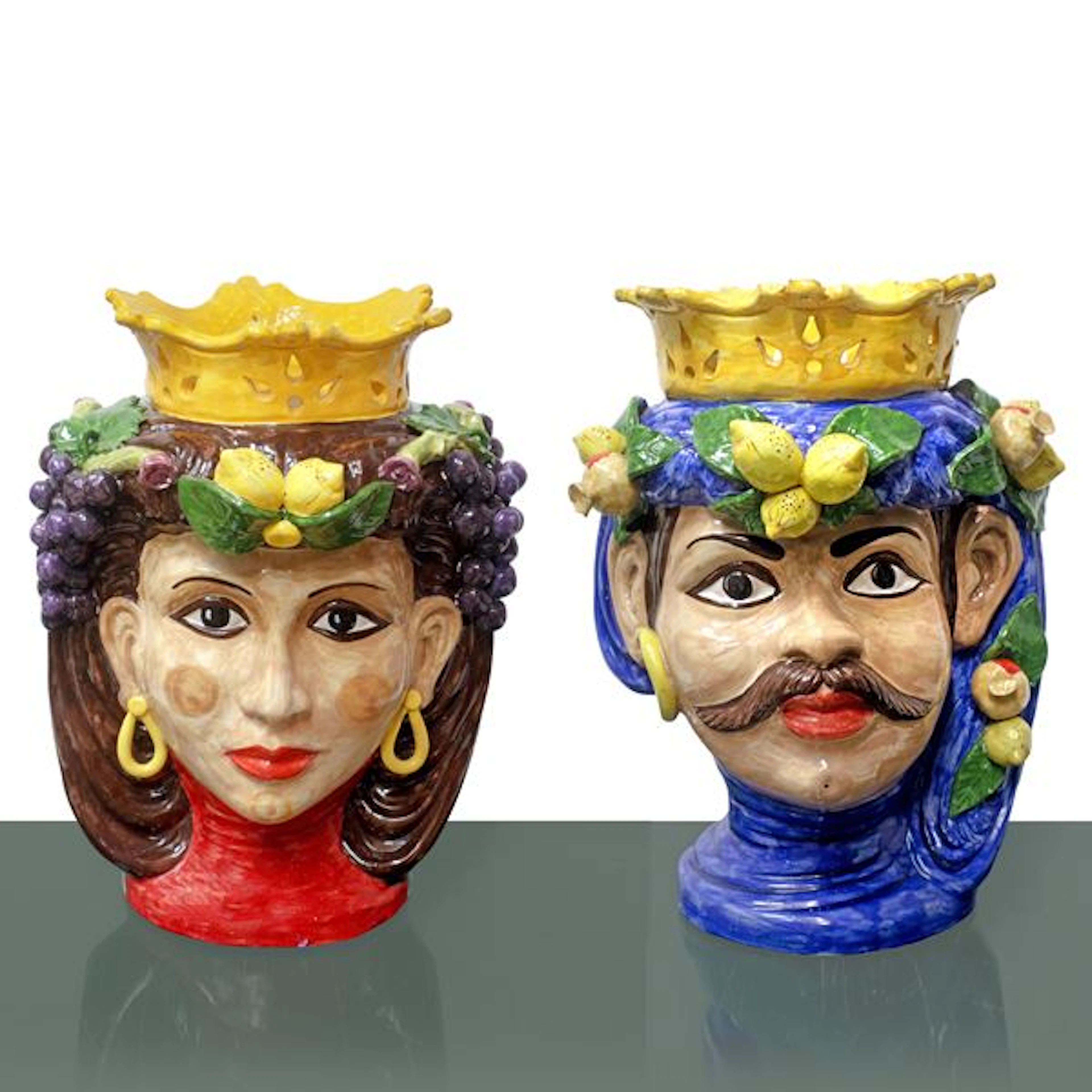 Coppia di teste di moro in maiolica di Caltagirone dipinta policroma