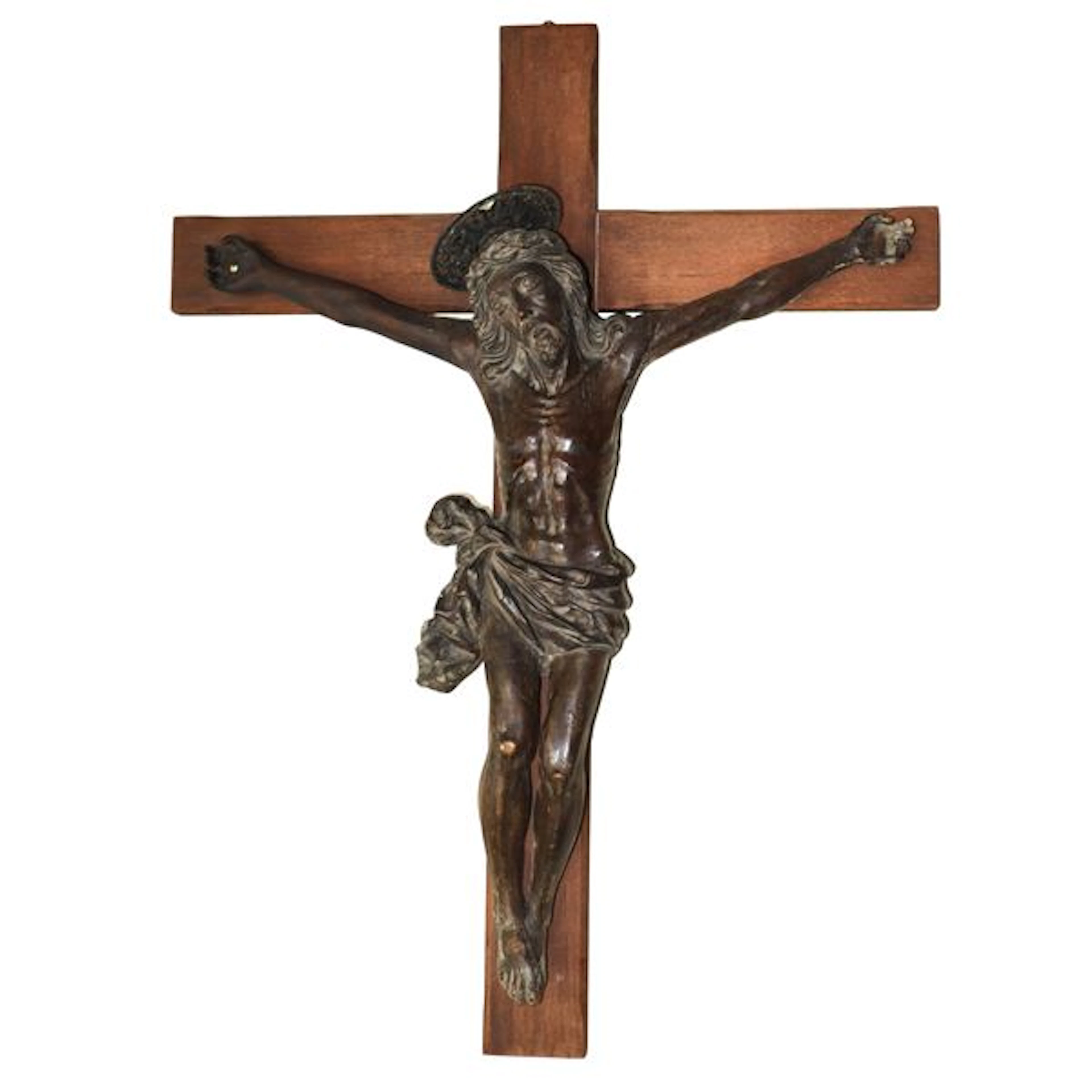 Crocifisso ligneo, con scultura di Cristo in legno patinato bruno.