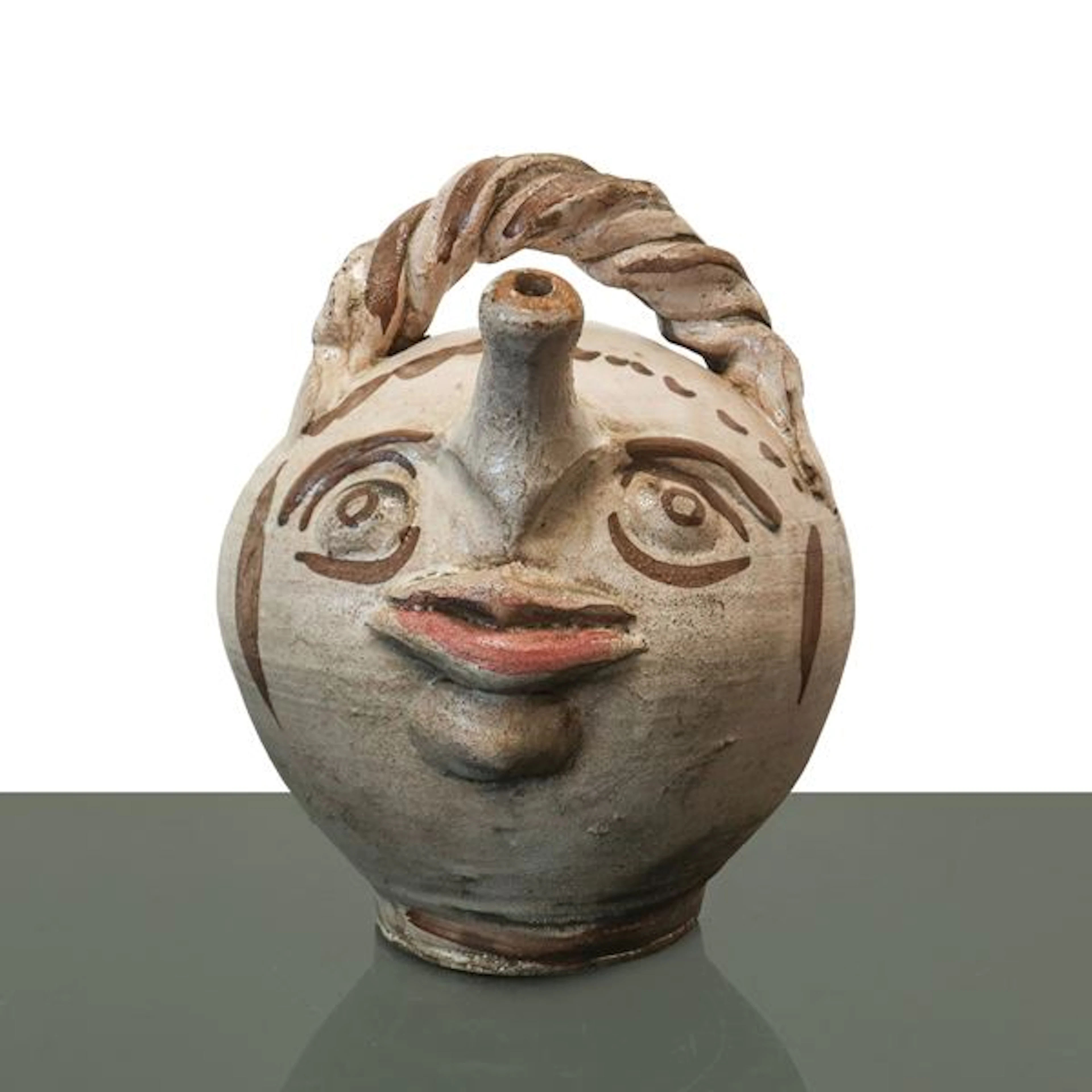 Brocca in maiolica di Caltagirone dalle fattezze antropomorfe decorata