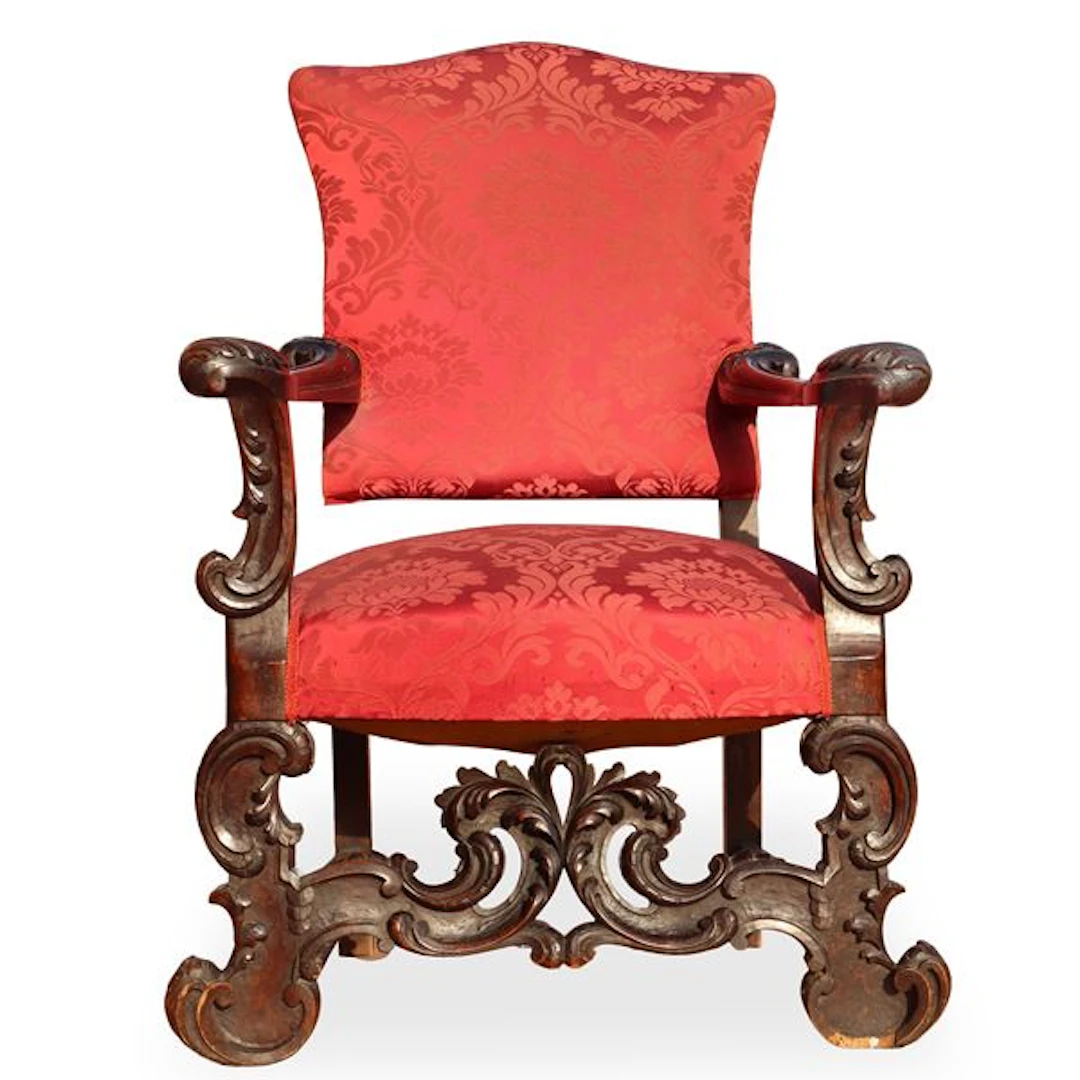 Poltrona con spalliera alta e tappezzeria rossa damascata, XVIII secolo