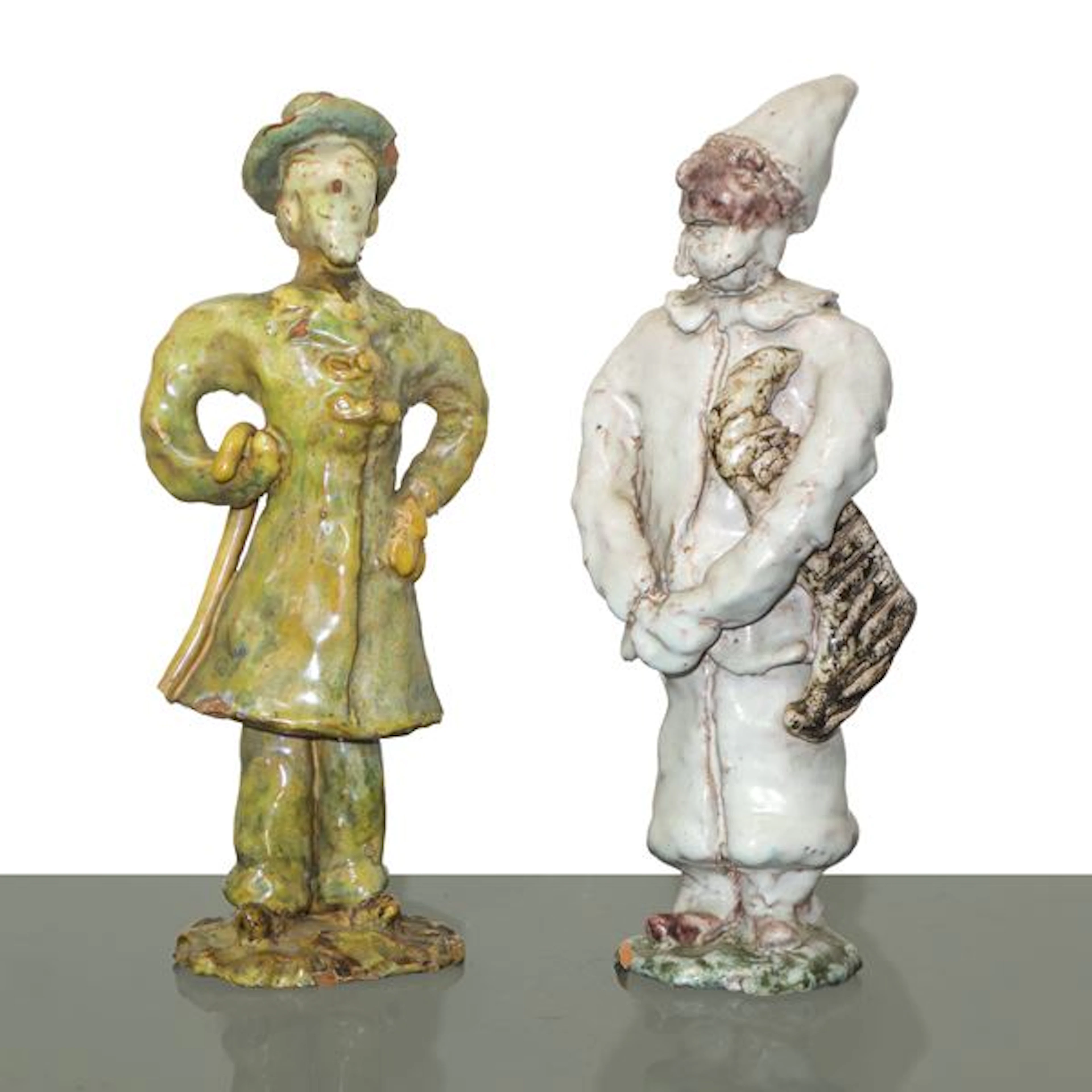 Coppia di figurine in maiolica