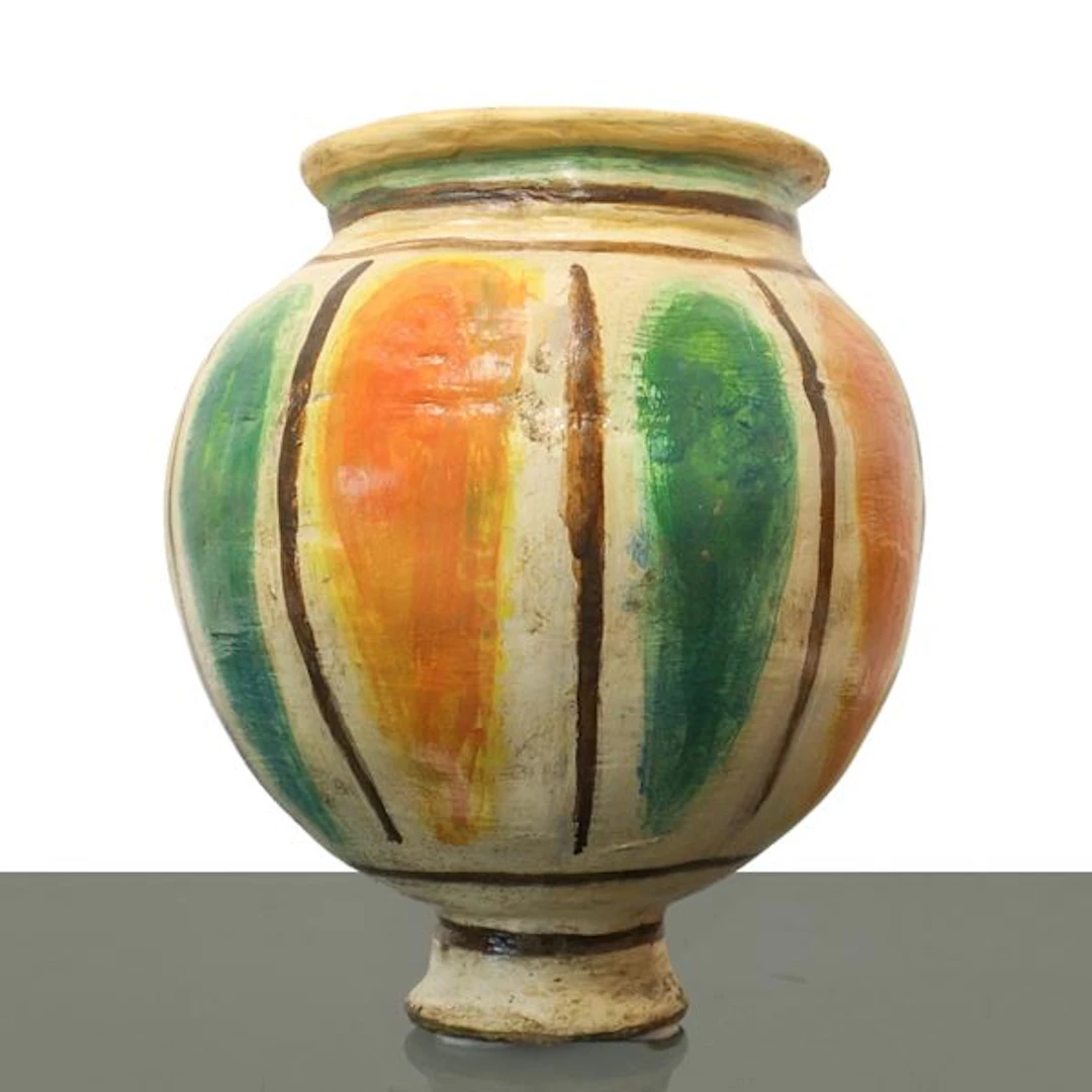 Boccia in maiolica di Caltagirone decorato a bande policrome nei toni