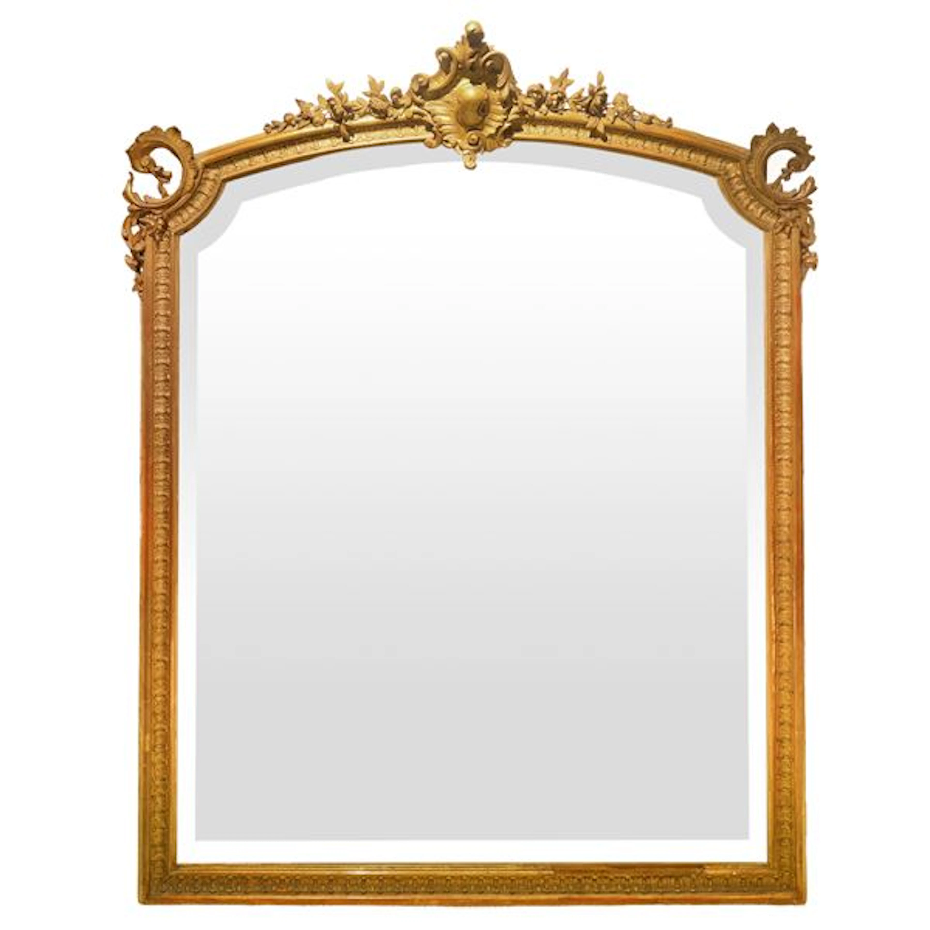 Grande specchio con cornice in legno dorato con cimasa centrale intagliata