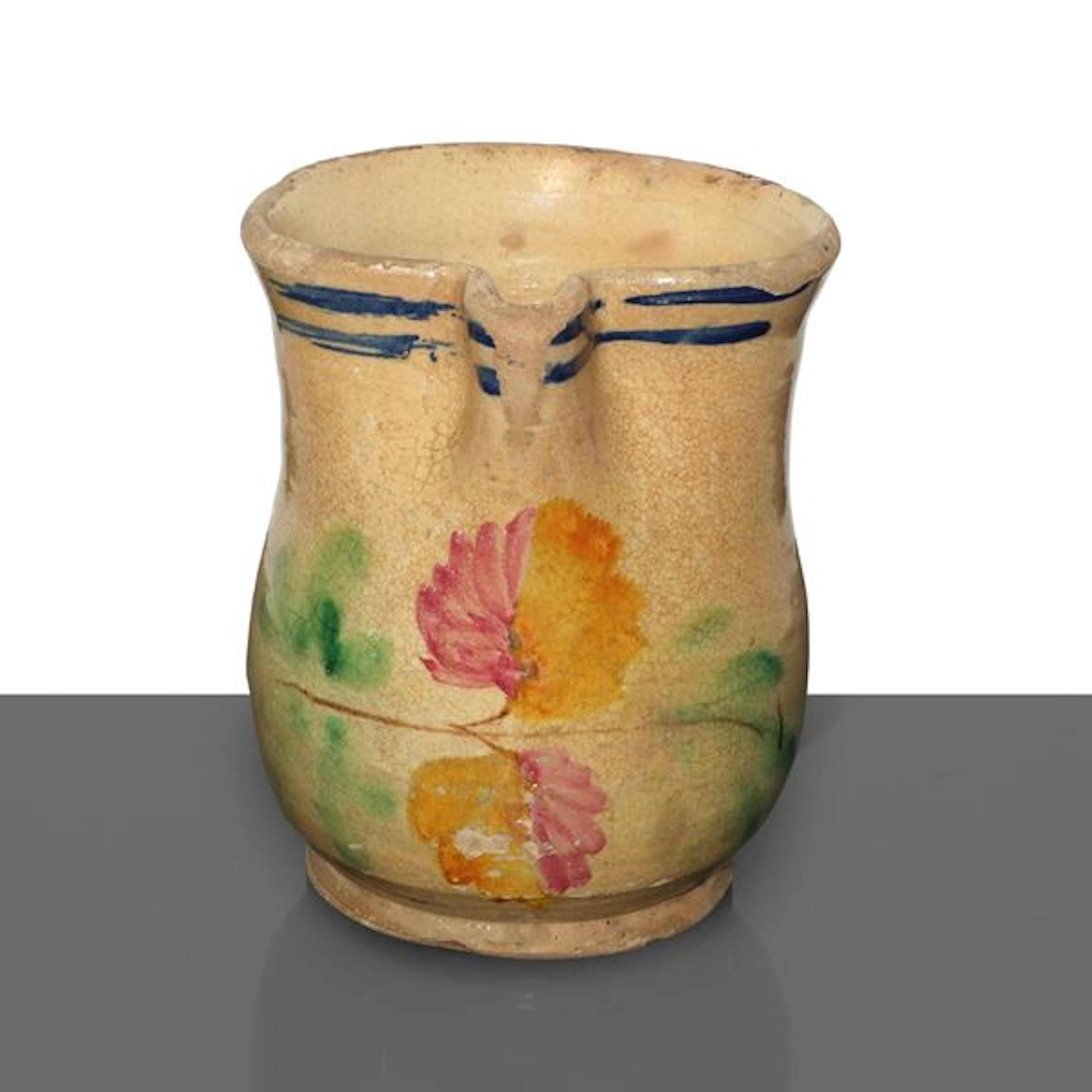 Cannata in maiolica di Caltagirone invetriata con fiore policromo al fronte