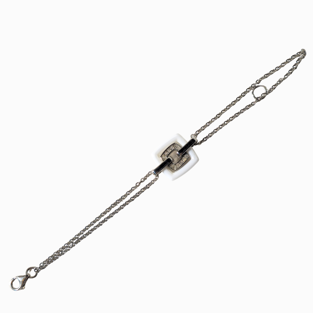 PULSERA EN PLATA Y CIRCONITAS.