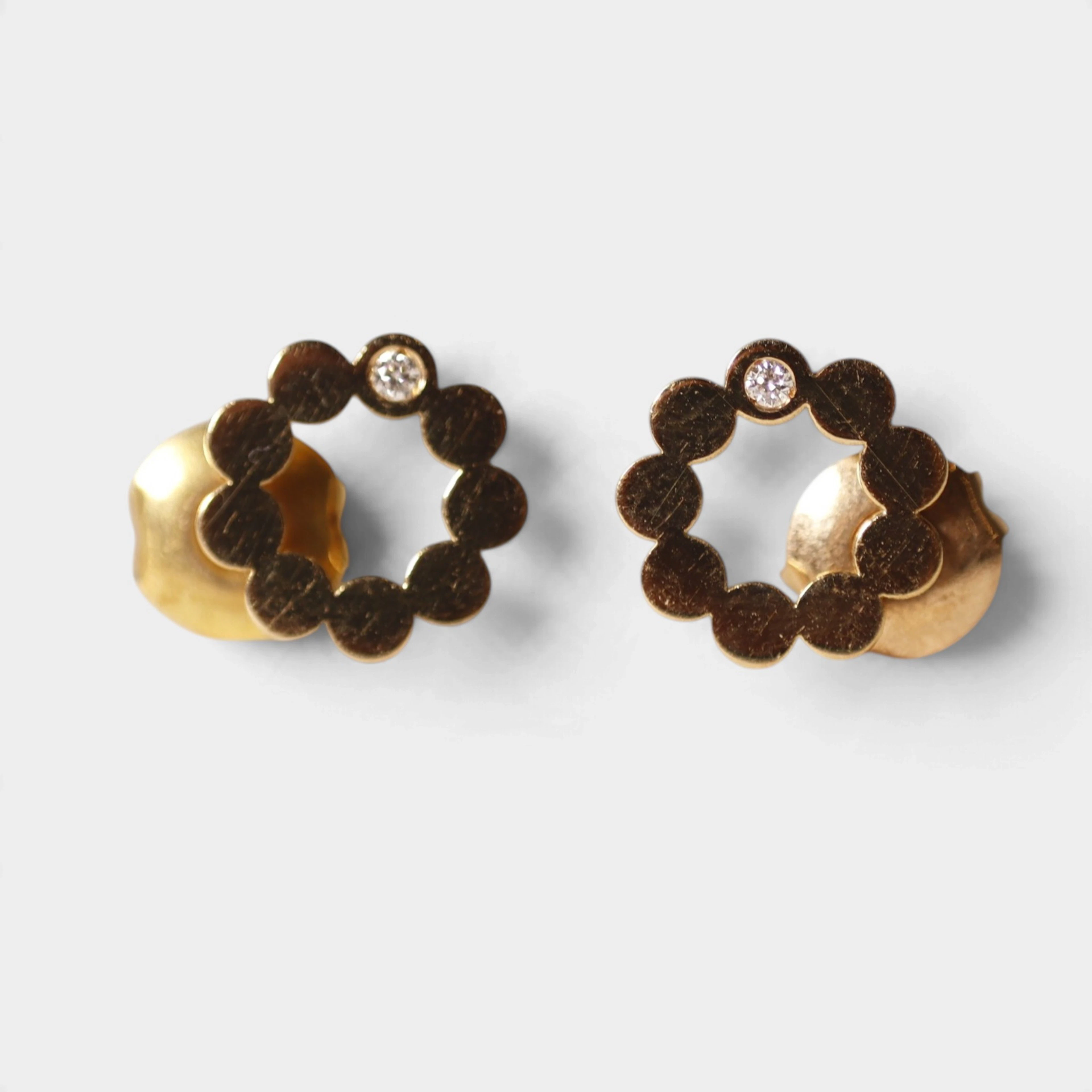 Pendientes en oro 18K y diamante.