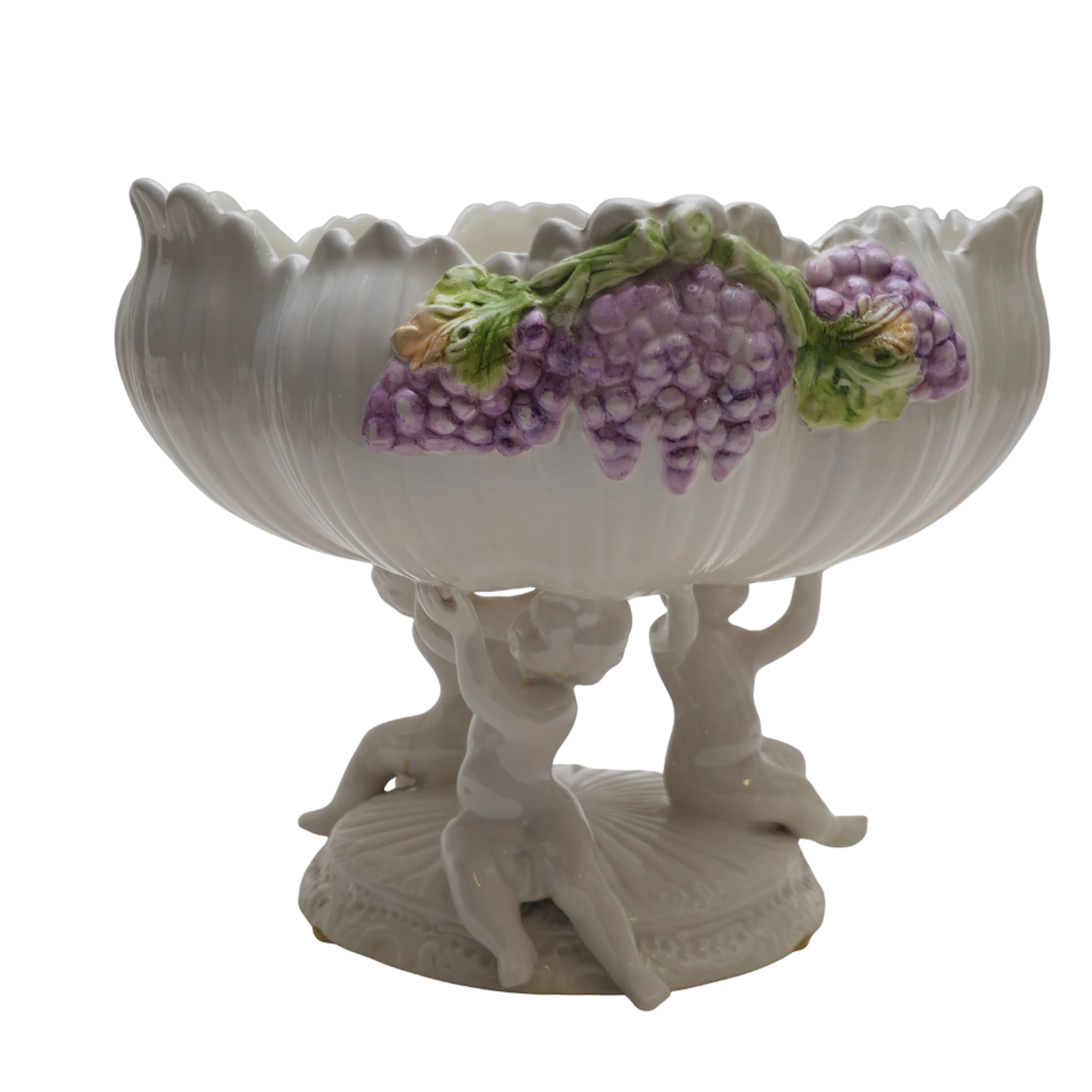CENTRO DE PORCELANA CON PUTTI. FIRMA ITALIANA EN LA BASE.
