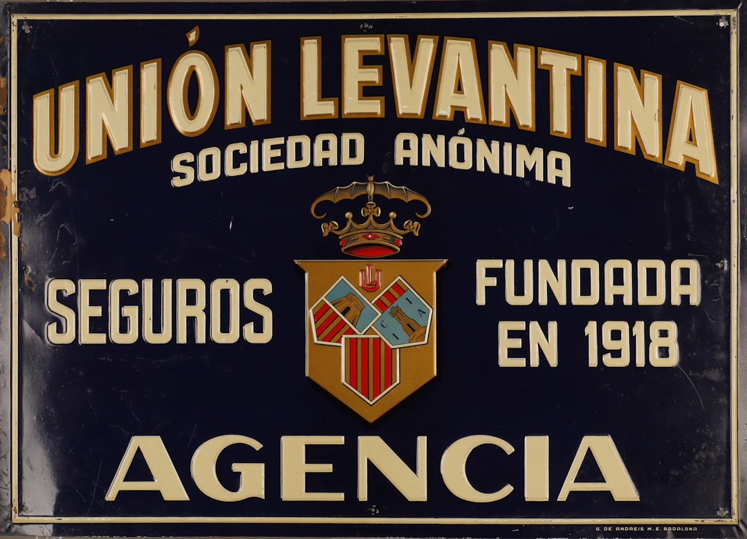 Unión Levantina, placa publicitaria en hojalata estampada y pintada.