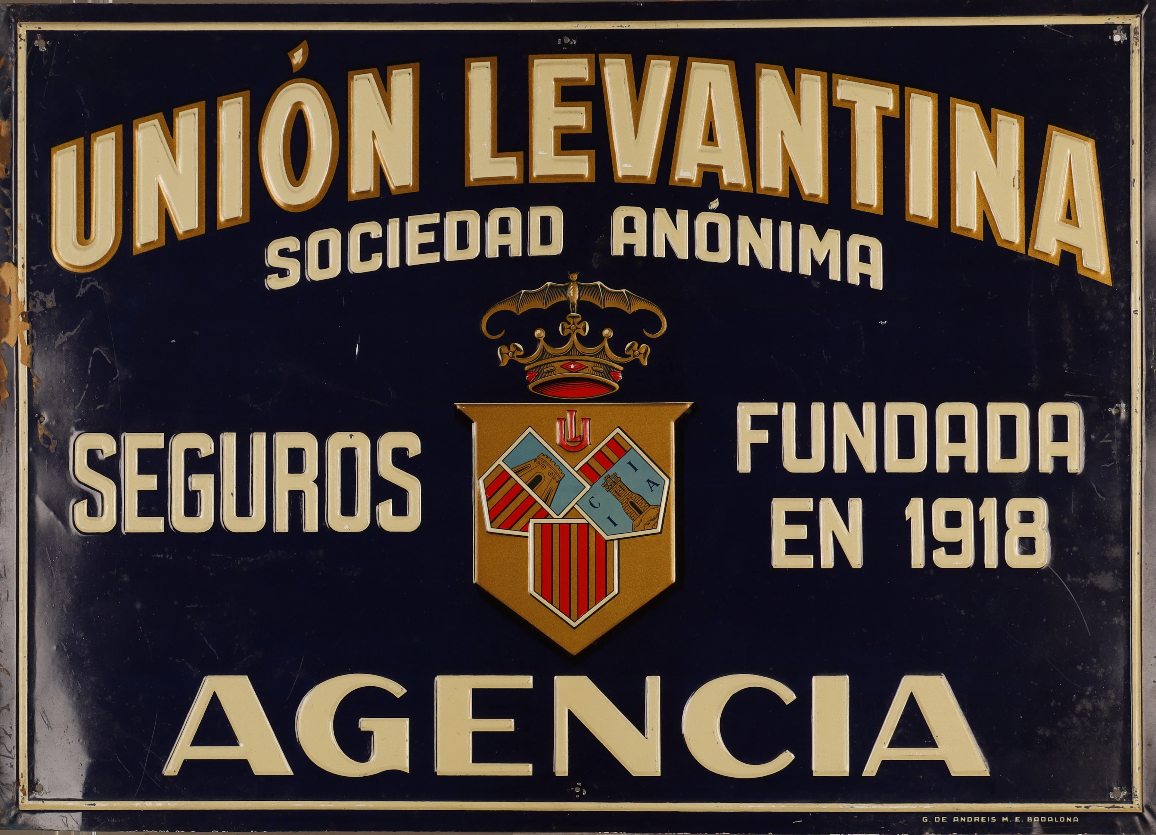 Unión Levantina, placa publicitaria en hojalata estampada y pintada.