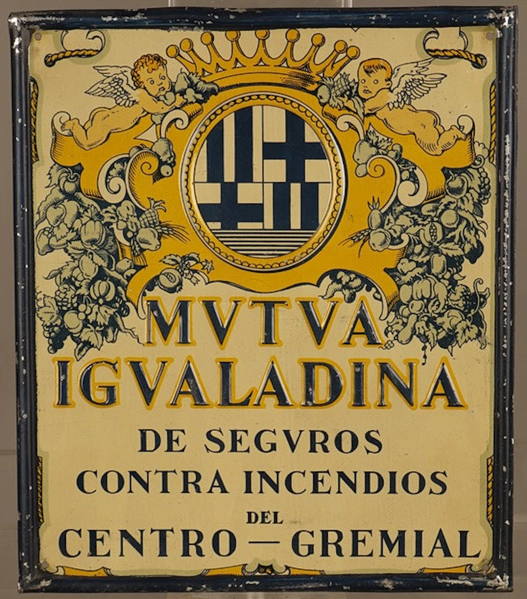Mutua Igualadina, placa publicitaria en hojalata estampada y litografiada.