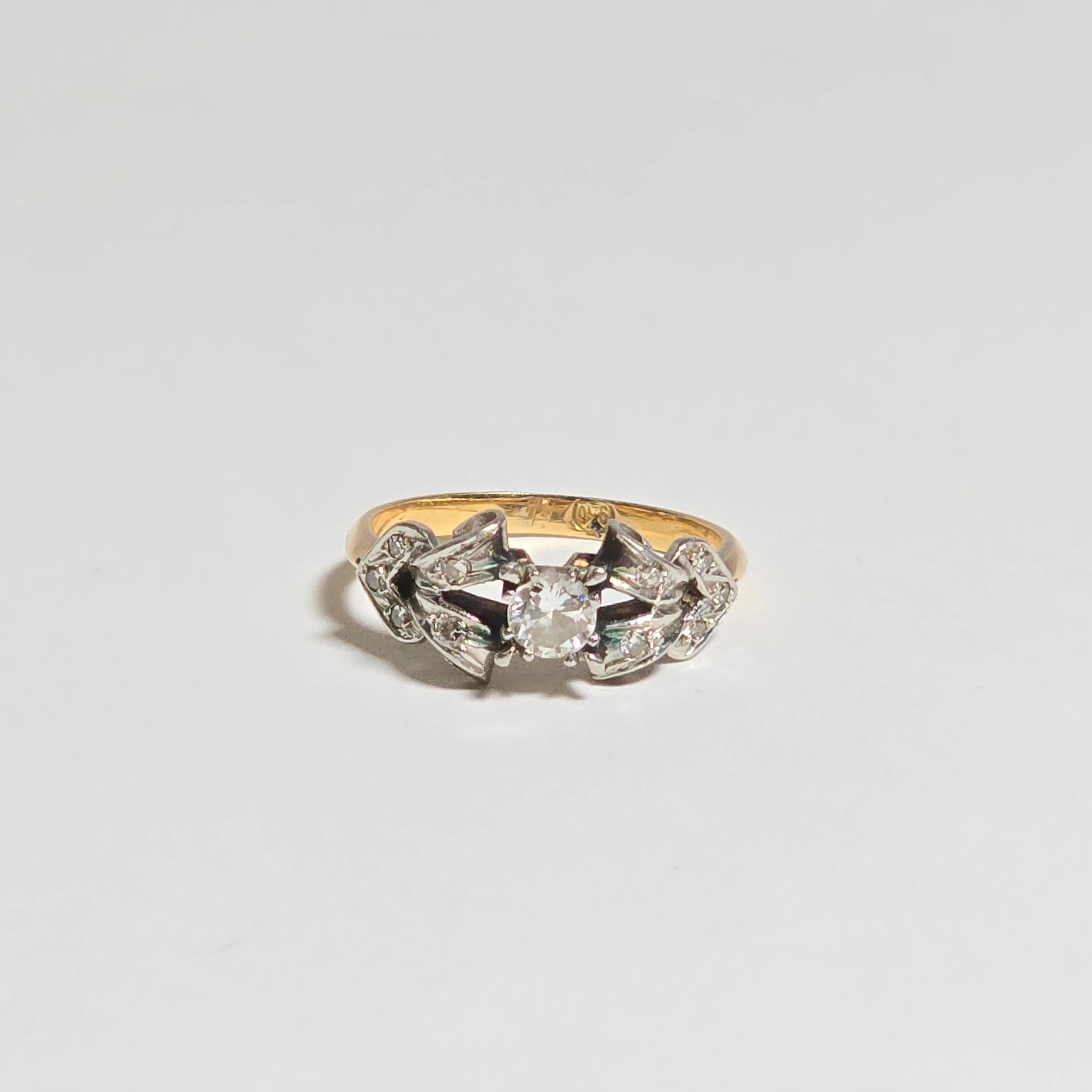ANILLO EN ORO 18KT Y PLATINO CON DIAMANTE CENTRAL 0,37 KT.