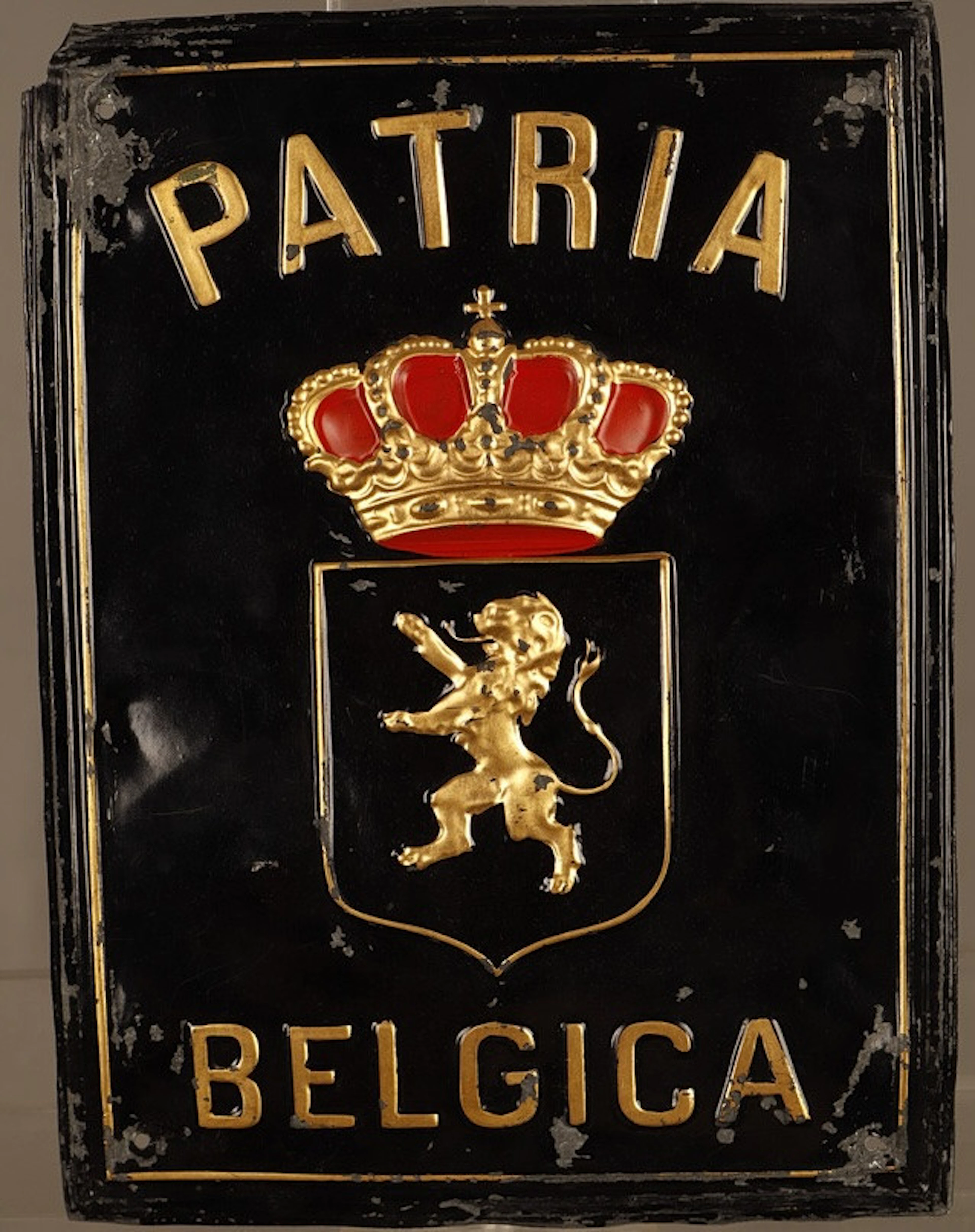 Patria Belgica, placa publicitaria en plancha de zinc estampada y pintada.
