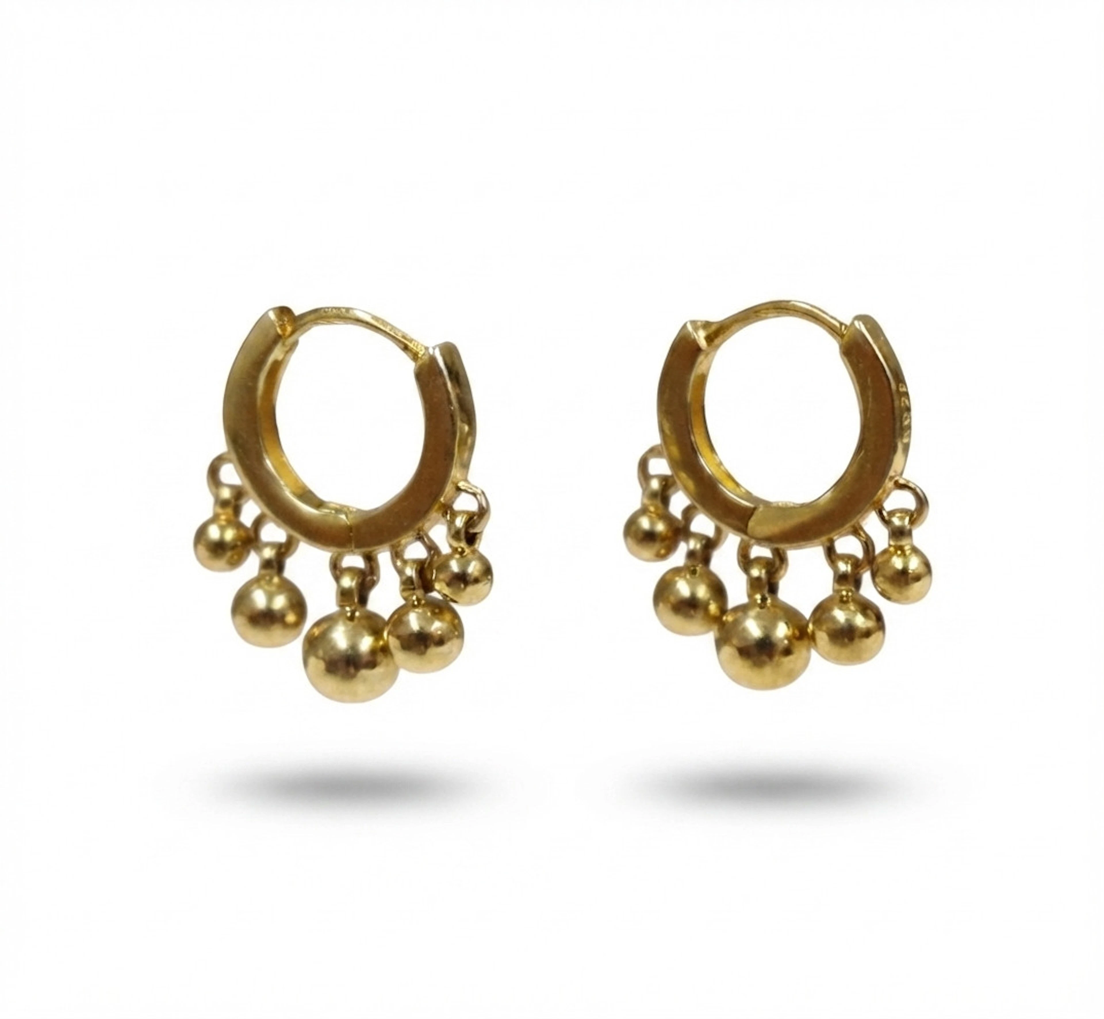 Pendientes en plata con baño de oro.