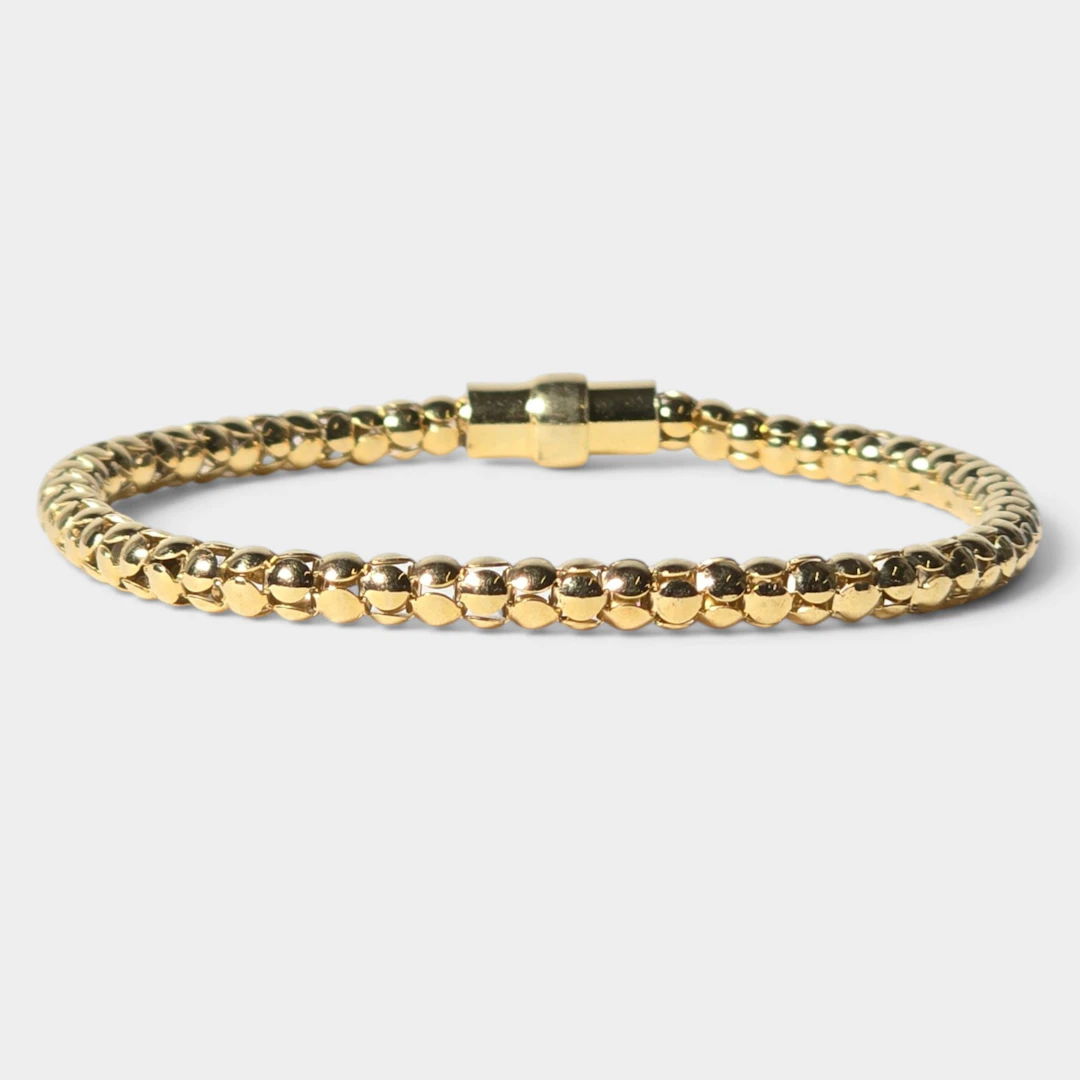 Pulsera en plata con baño de oro.