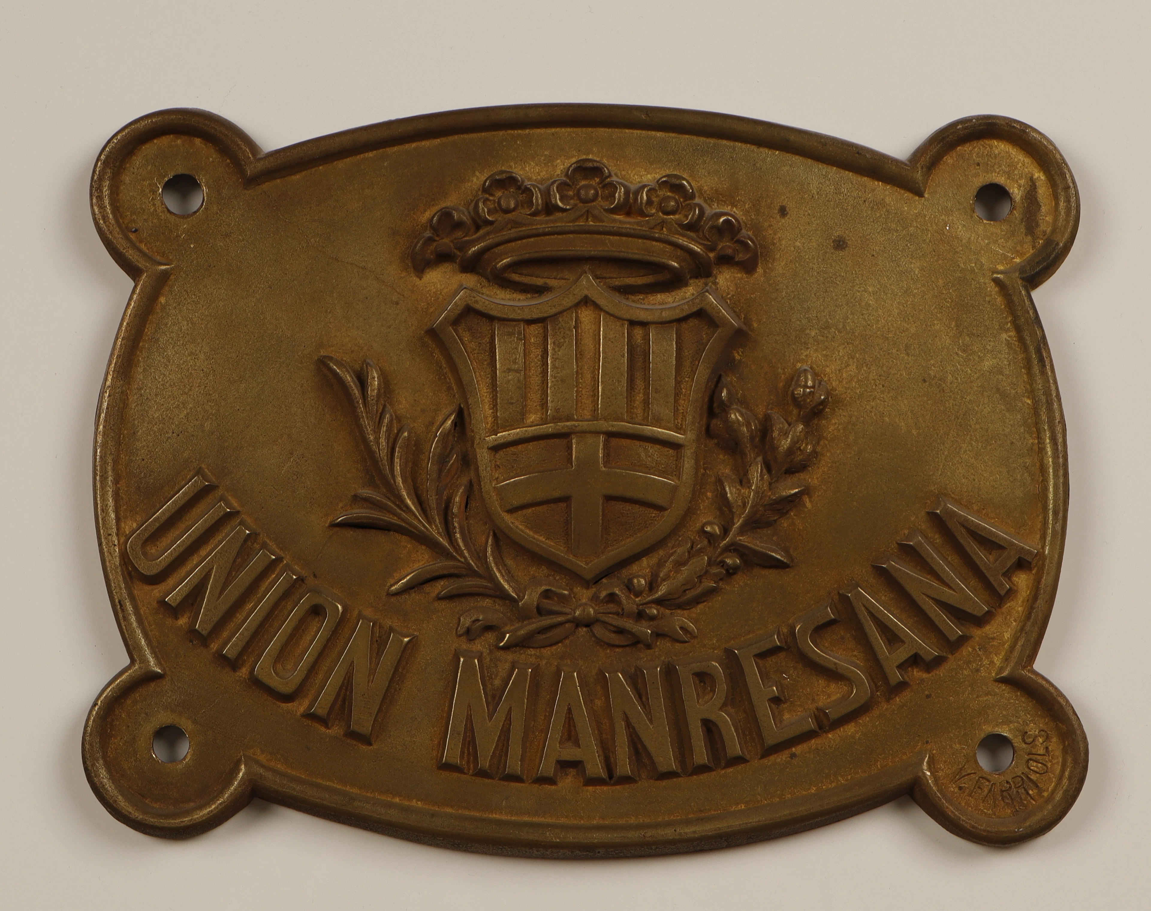 Unión Manresana, placa publicitaria en latón.