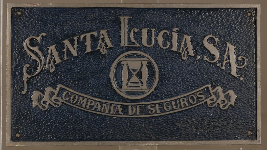 Santa Lucía, placa publicitaria en aluminio.