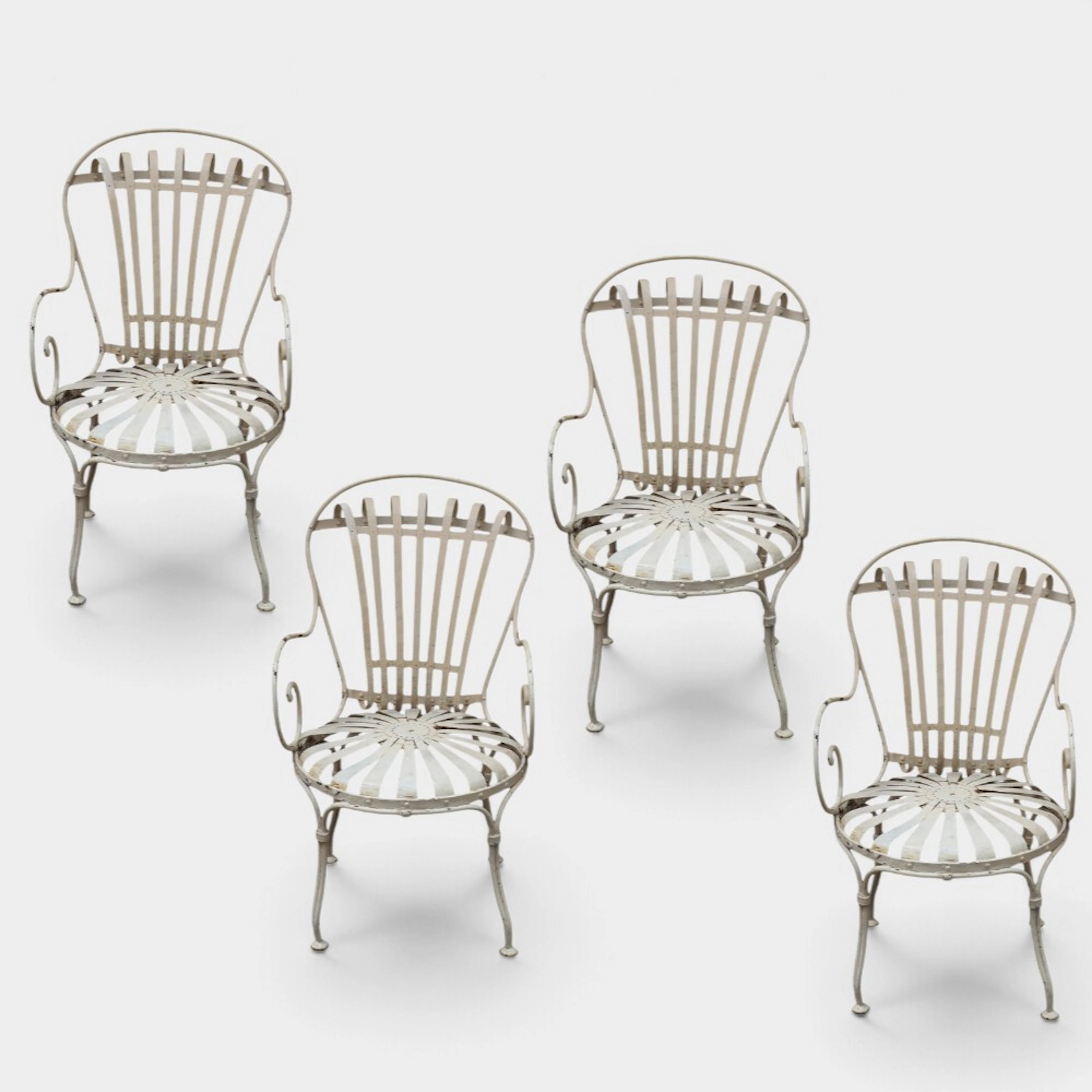 FRANÇOIS CARRÉ. Cuatro sillas de jardín en hierro pintado.