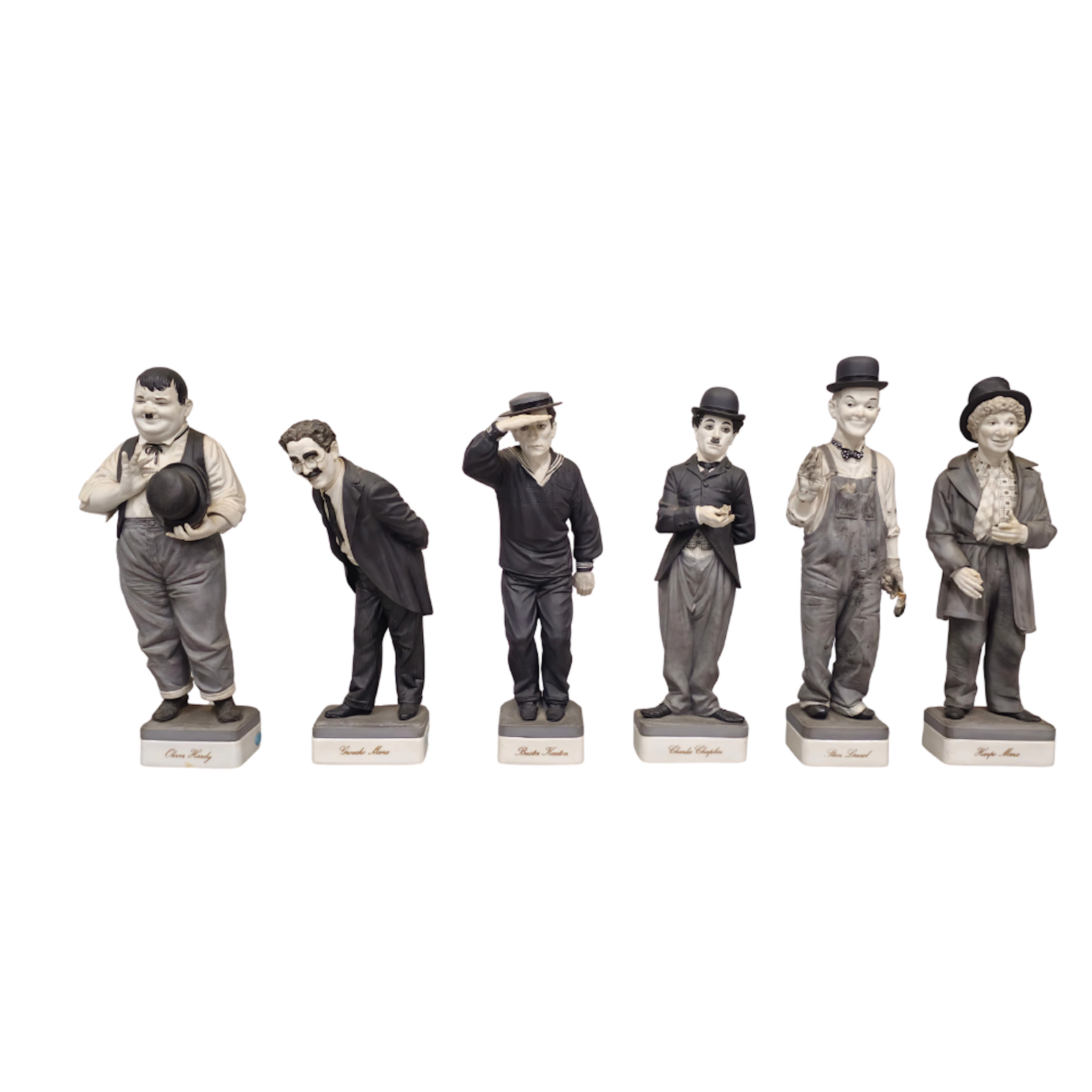 6 FIGURAS DE CINE MUDO EN PORCELANA BISCUIT. NUMERADAS.