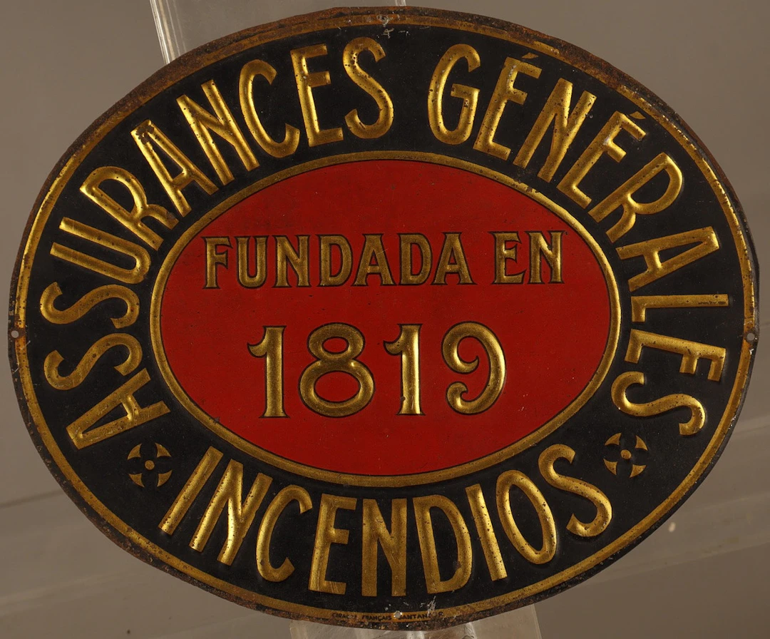 Assurances Générales, placa publicitaria en hojalata estampada y pintada.